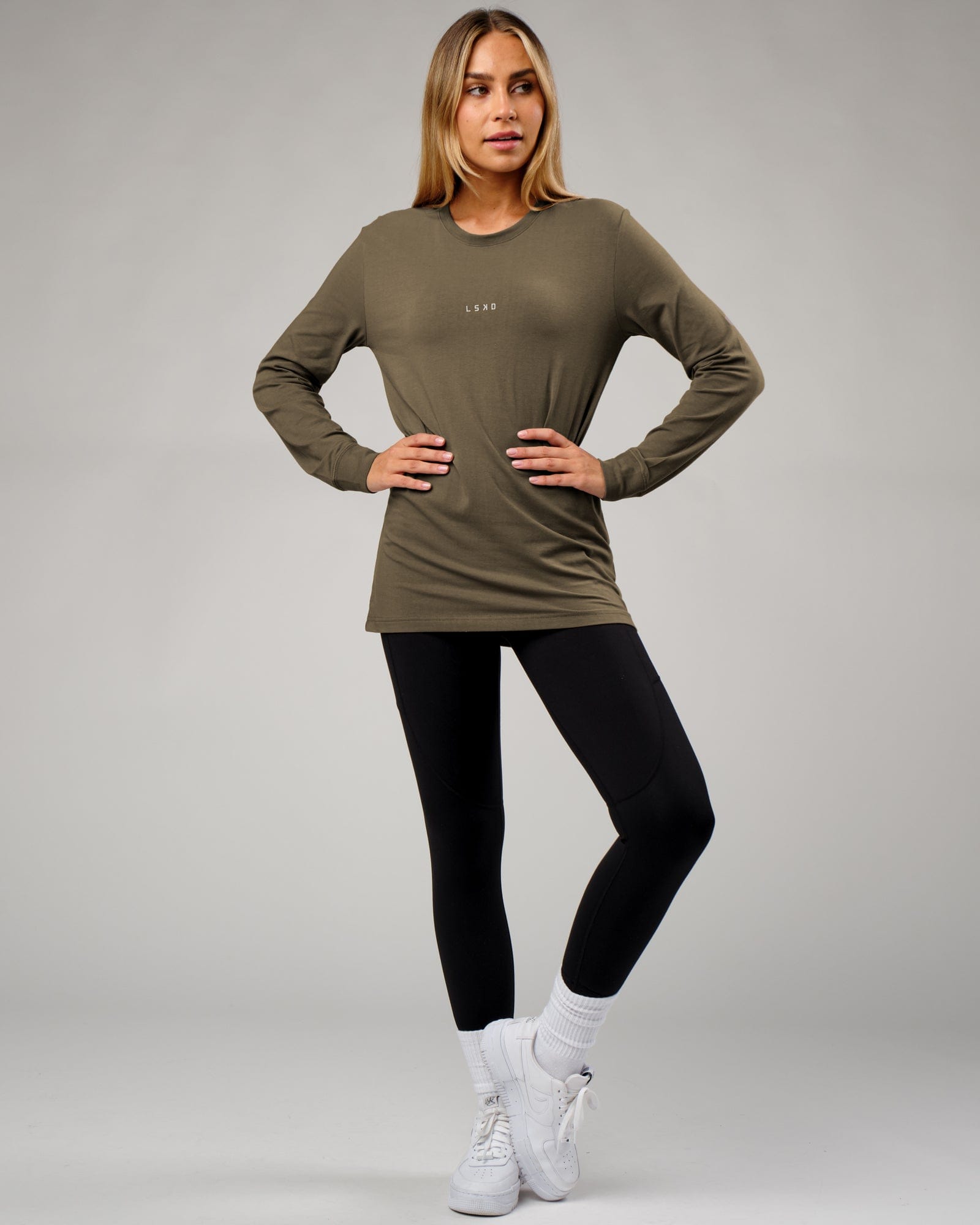 Model wearing Unisex Base LS Tee - Walnut Grey