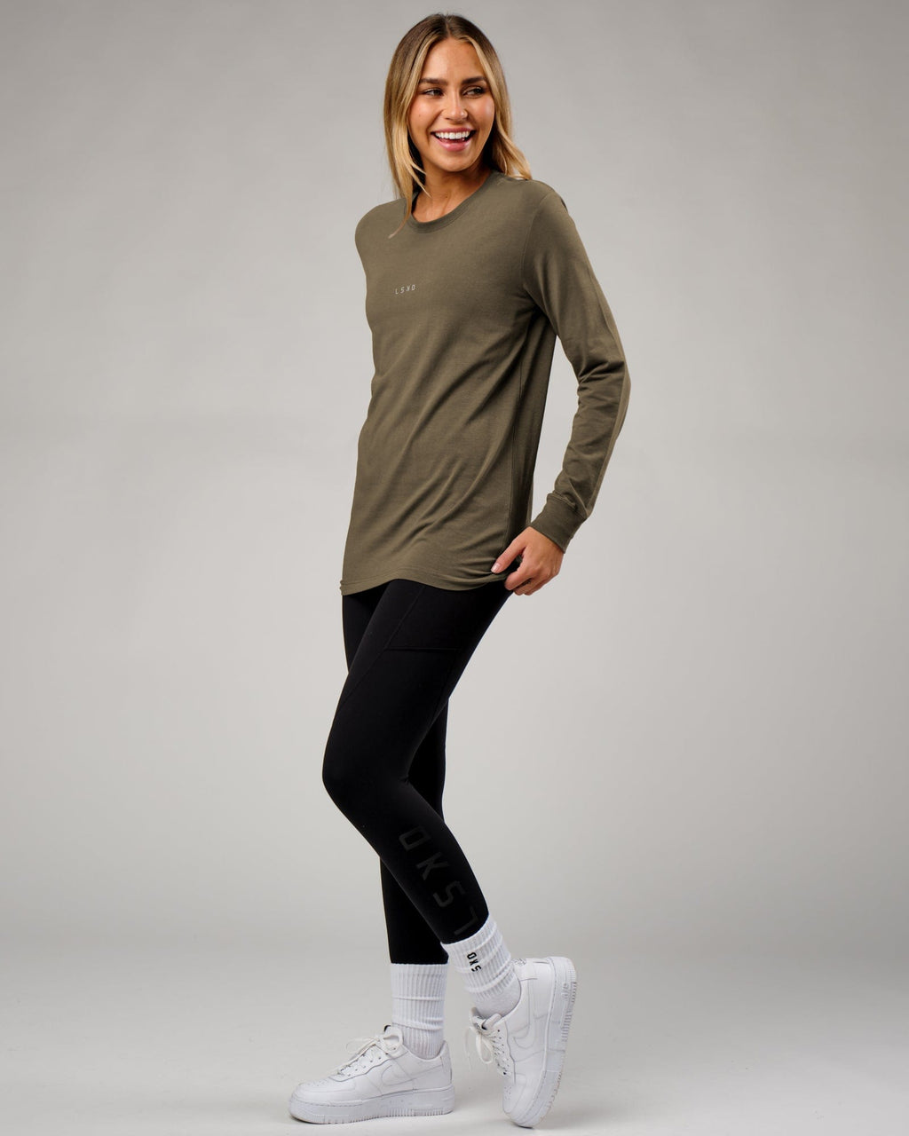 Model wearing Unisex Base LS Tee - Walnut Grey