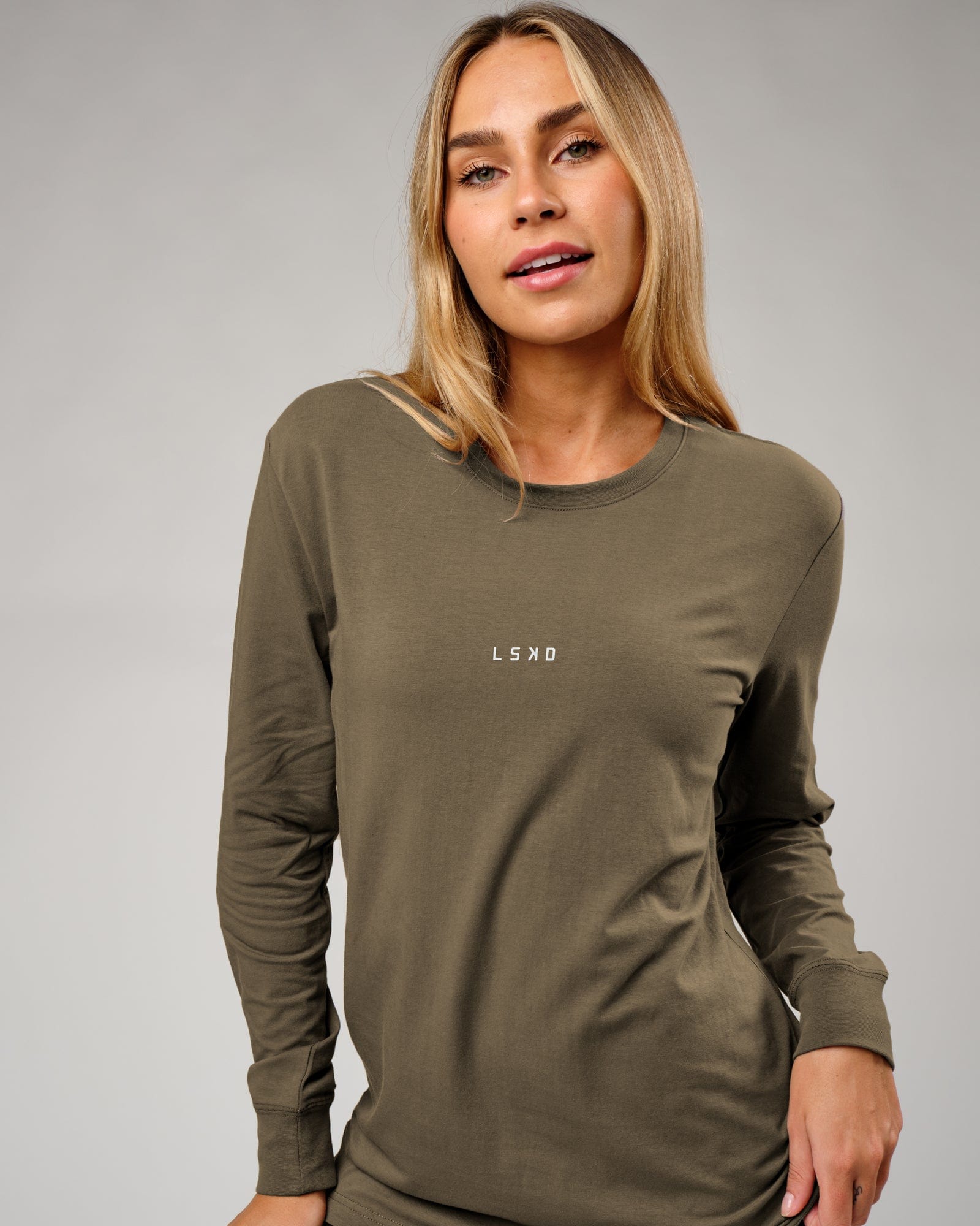 Model wearing Unisex Base LS Tee - Walnut Grey