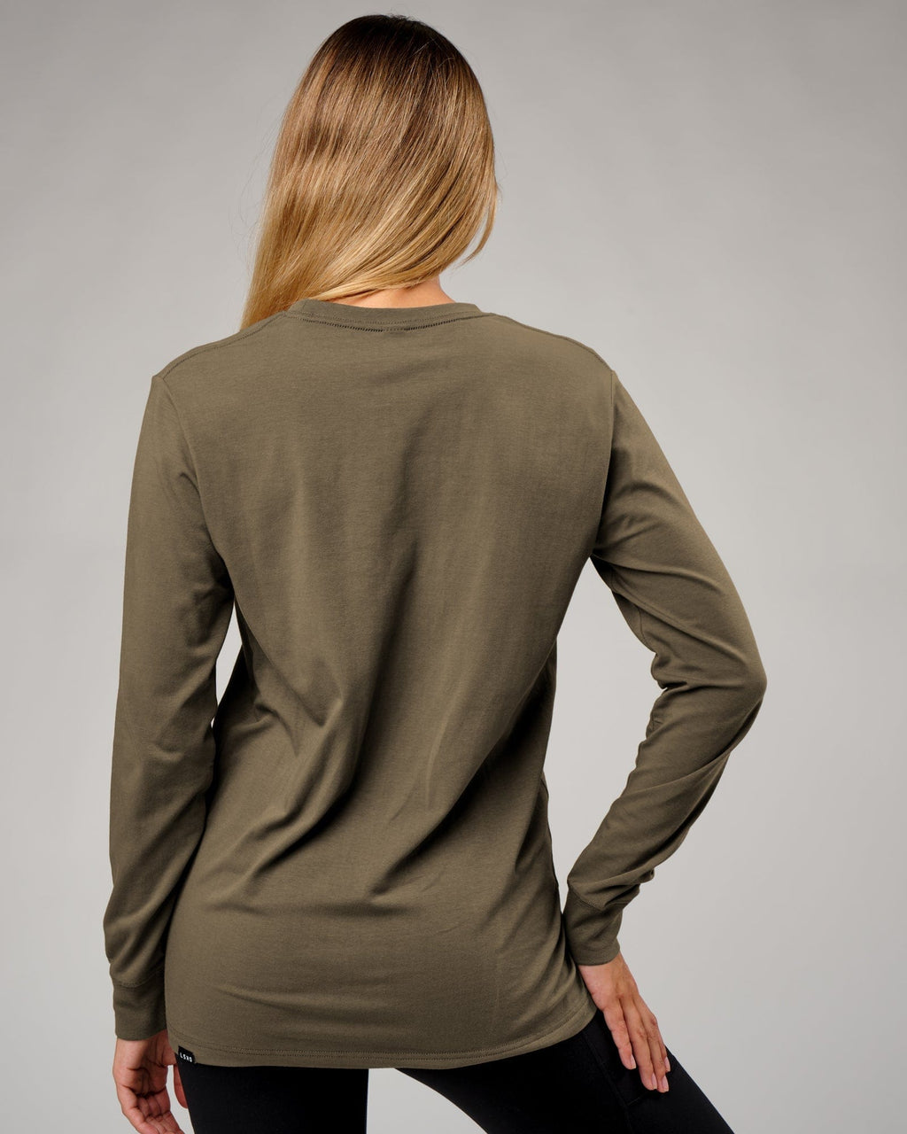 Model wearing Unisex Base LS Tee - Walnut Grey