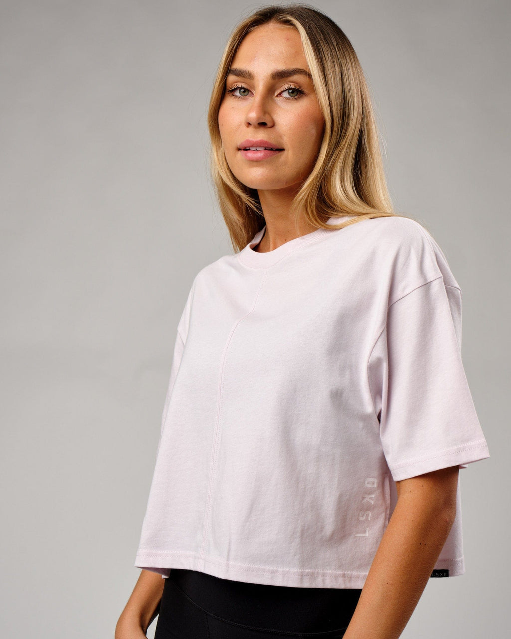 Model wearing Bella Tee - Orchid Ice