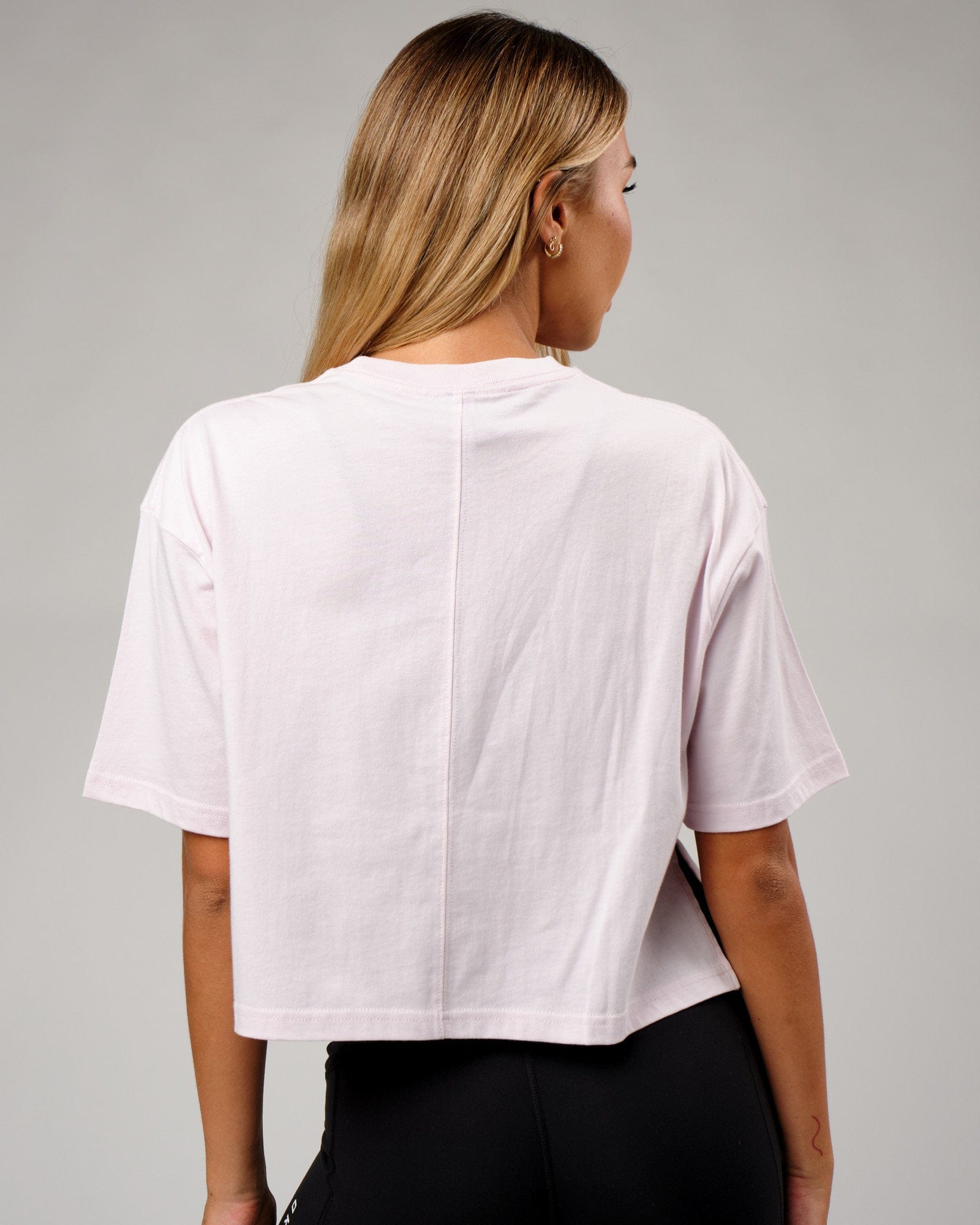 Model wearing Bella Tee - Orchid Ice