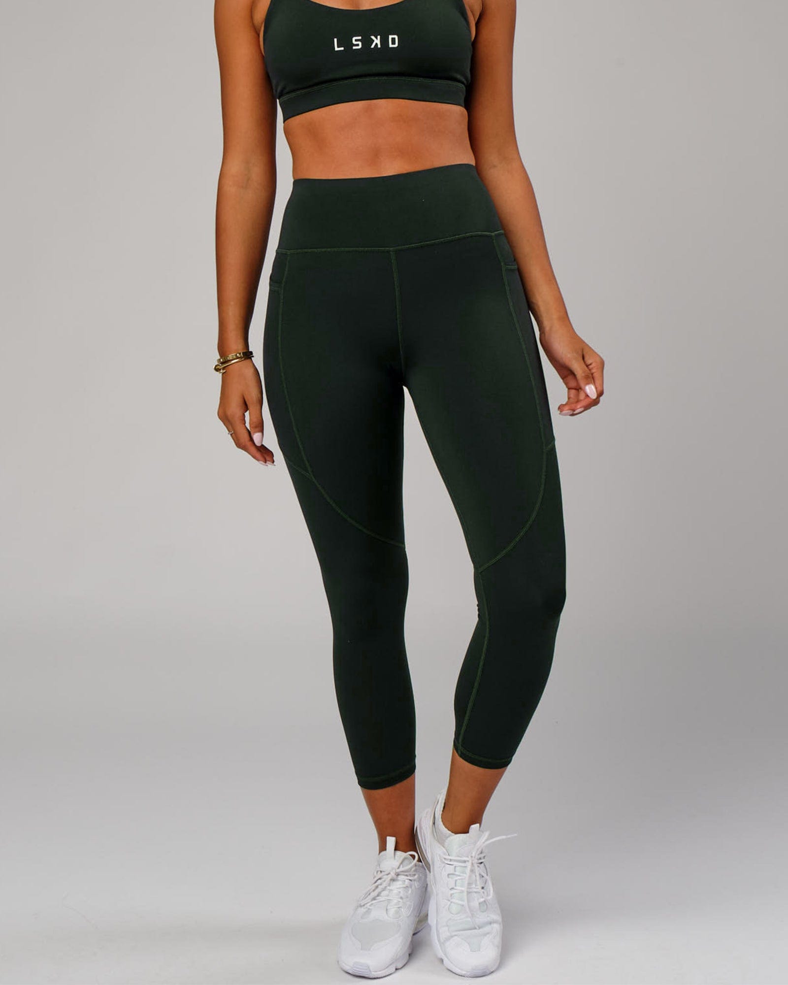 Model wearing Rep 7/8 Length Tight - Forest