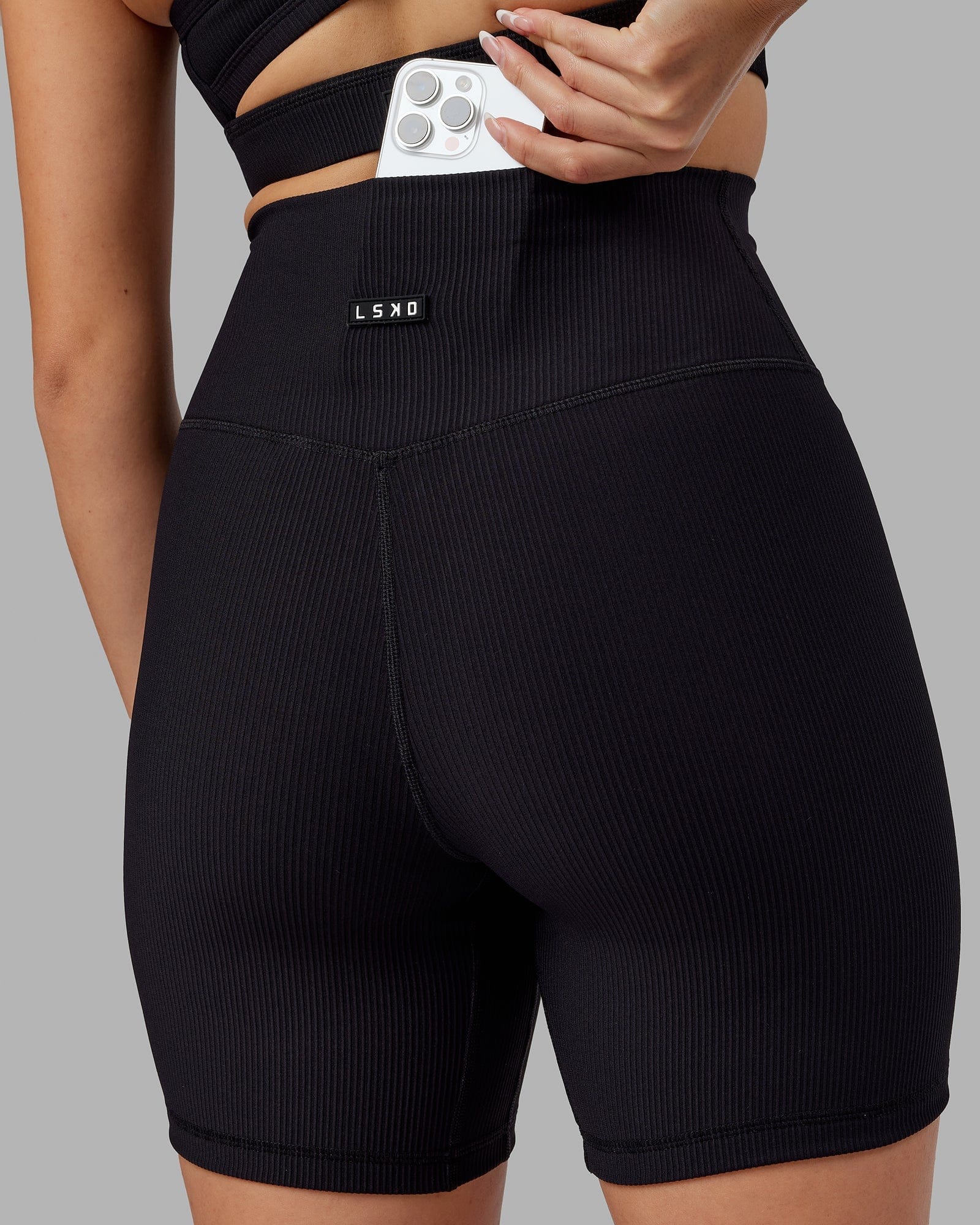 Model wearing Strike Ribbed Mid Short Tights - Black