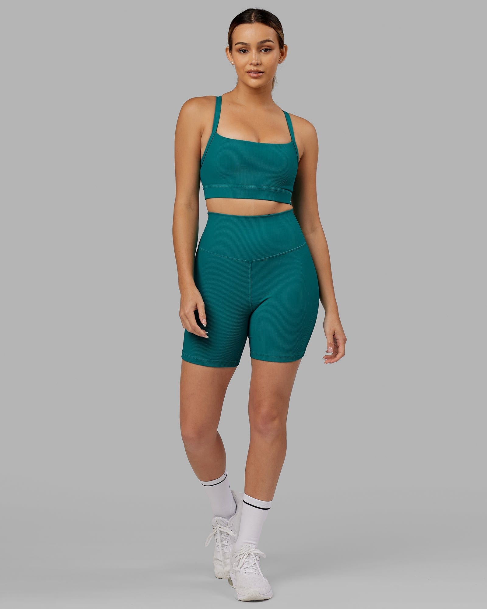 Model wearing Strike Ribbed Mid Short Tights - Sea Green