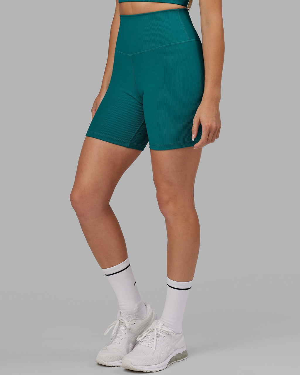 Model wearing Strike Ribbed Mid Short Tights - Sea Green