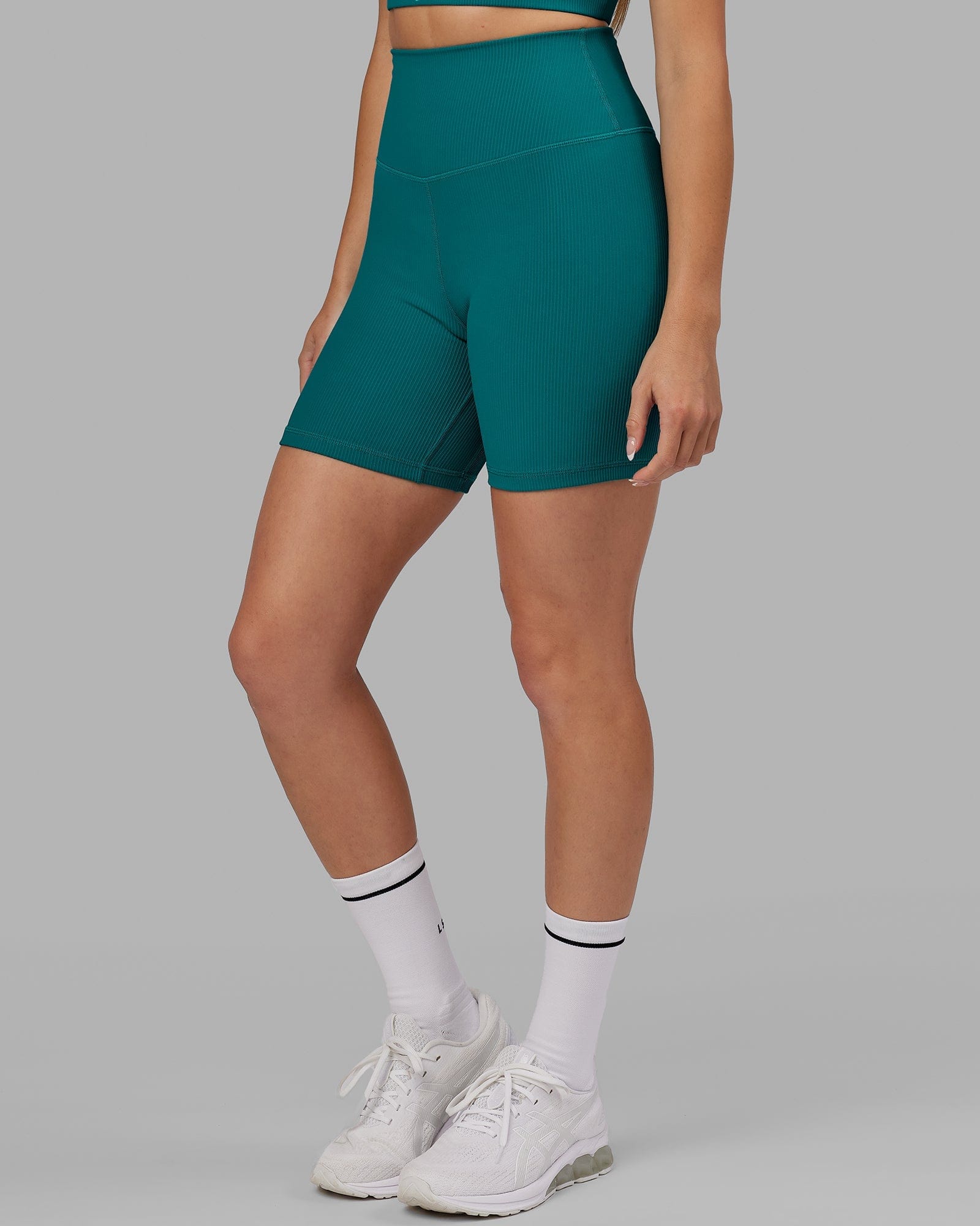 Model wearing Strike Ribbed Mid Short Tights - Sea Green