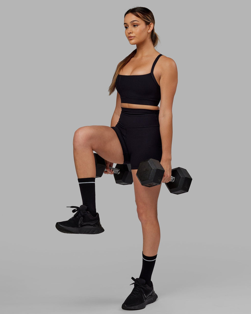 Model wearing Strike Ribbed X Short Tights - Black