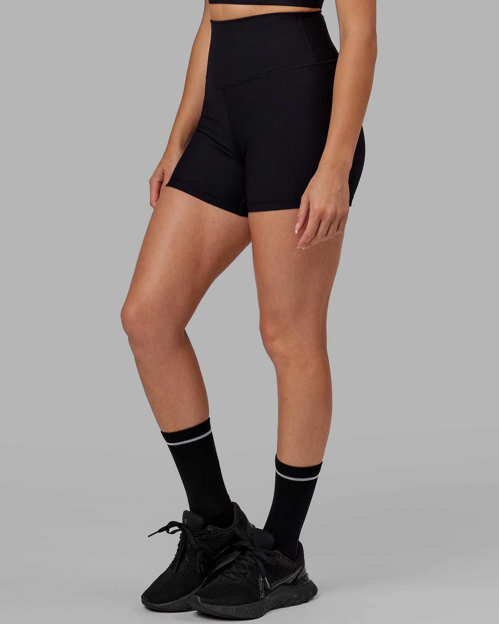Model wearing Strike Ribbed X Short Tights - Black