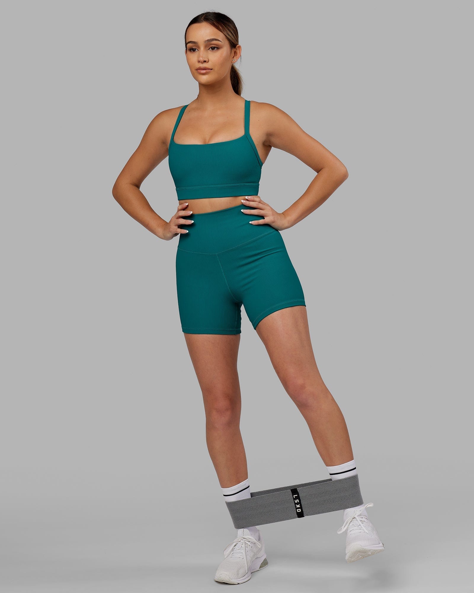 Model wearing Strike Ribbed X Short Tights - Sea Green