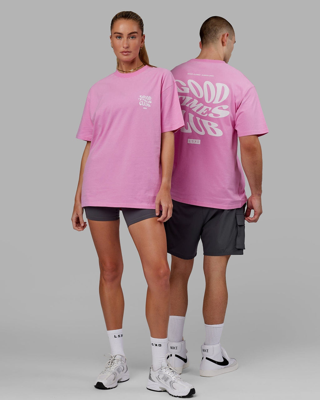 Model wearing Unisex Good Times Heavyweight Tee Oversize - Spark Pink