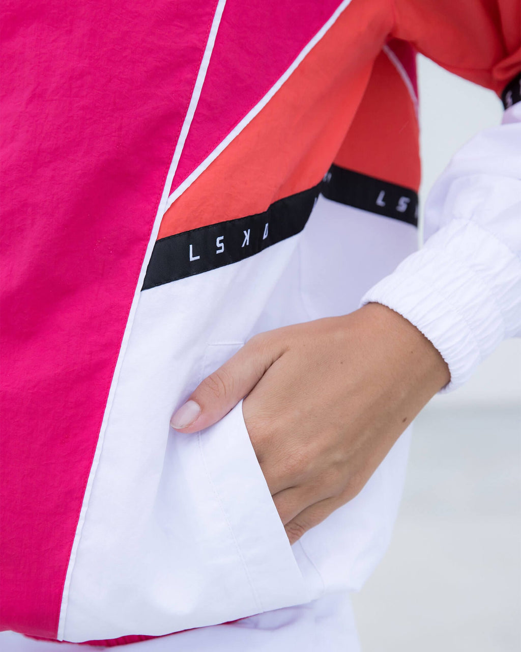 Model wearing Unisex Peak Zip Through Track Jacket Oversize - Boysenberry