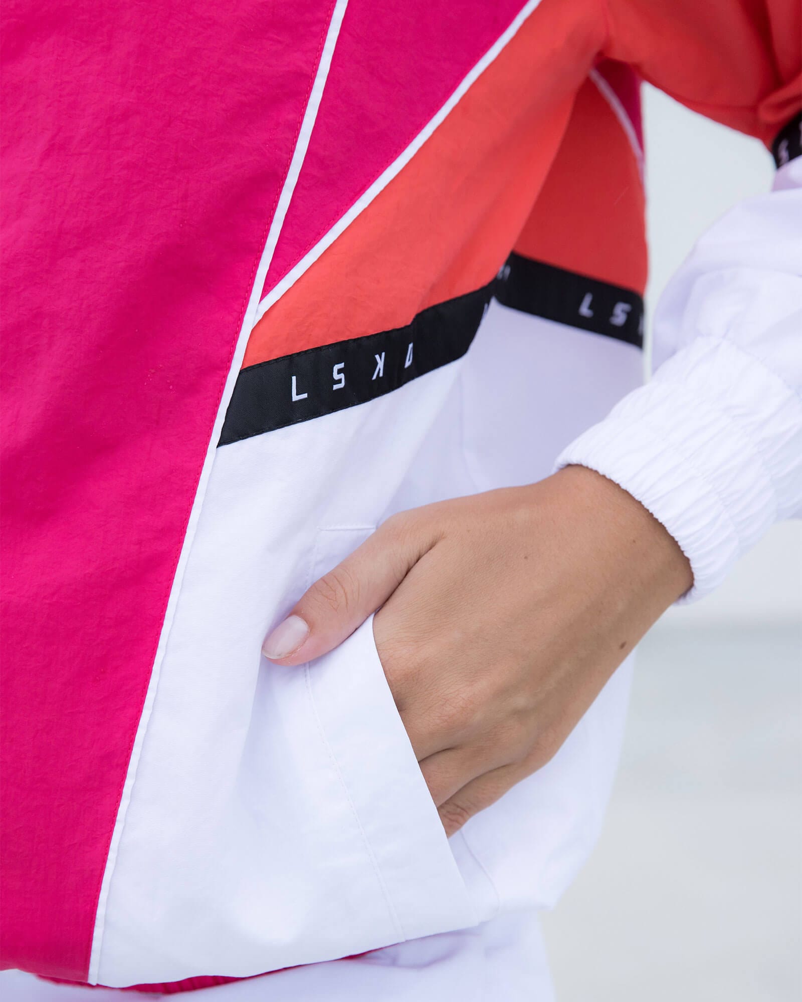 Model wearing Unisex Peak Zip Through Track Jacket Oversize - Boysenberry