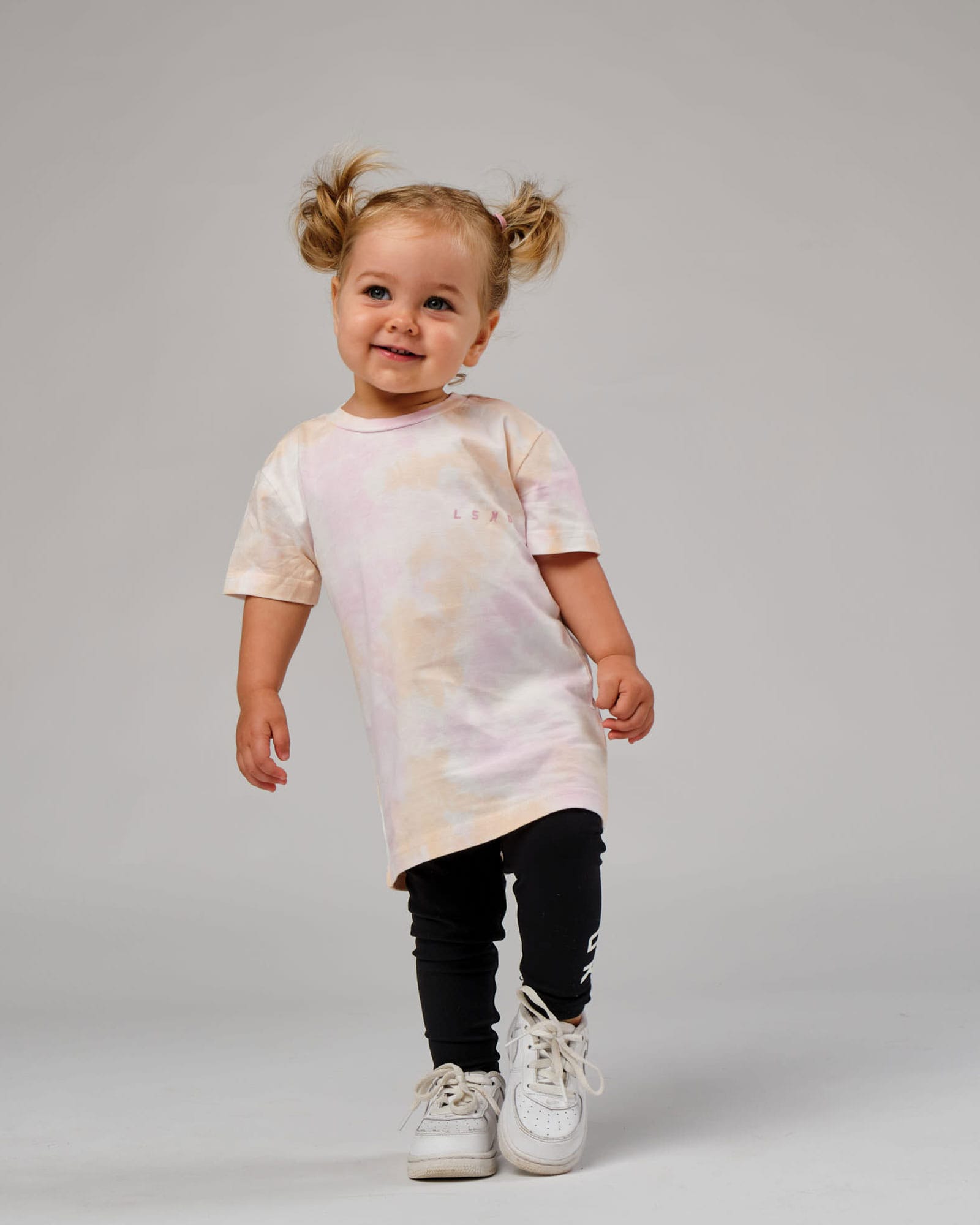 Model wearing CTA Tee (00-8) - Tutti Frutti Tie Dye