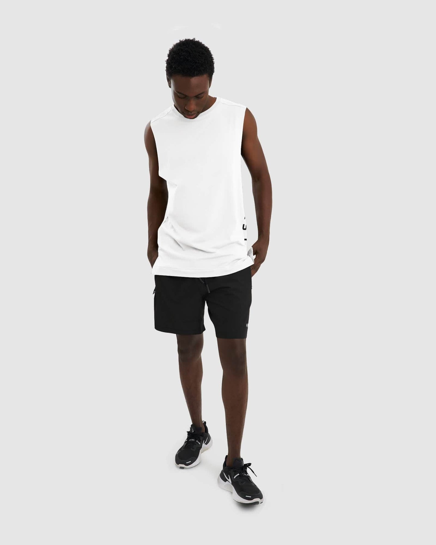 Model wearing Flex Tank - White Black