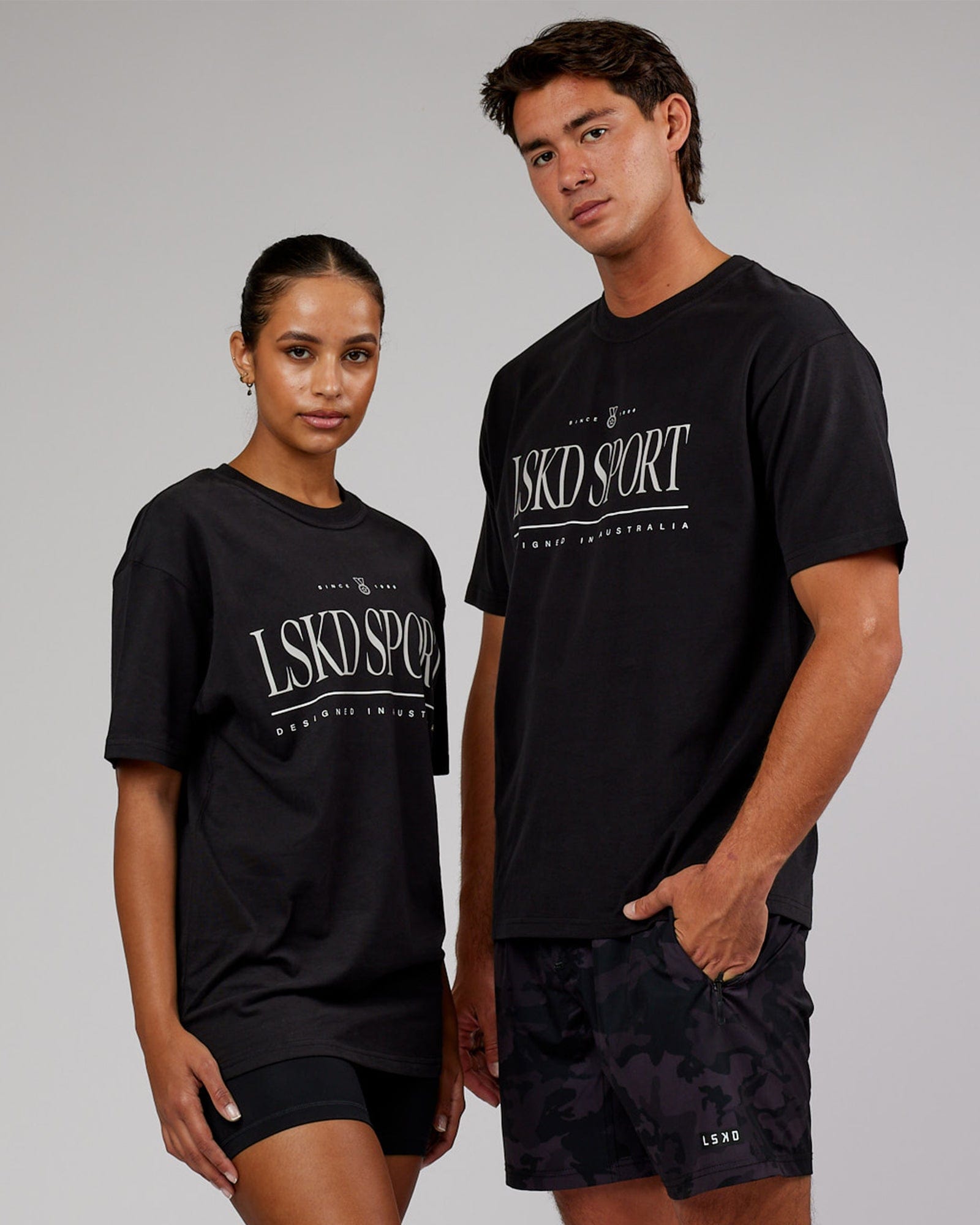 Model wearing Unisex Heritage Heavyweight Tee Oversize - Black-Beige