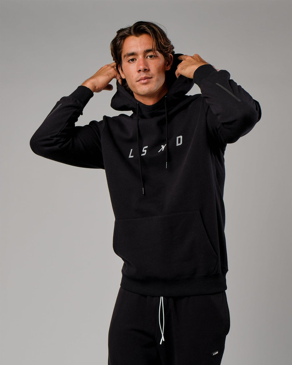 Model wearing Grid Hoodie - Black