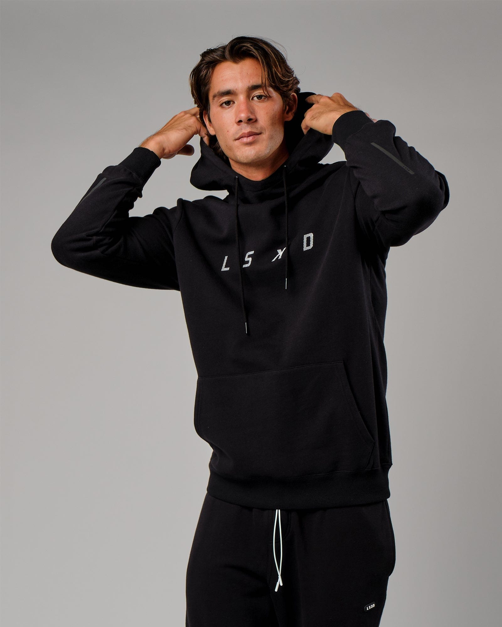 Model wearing Grid Hoodie - Black