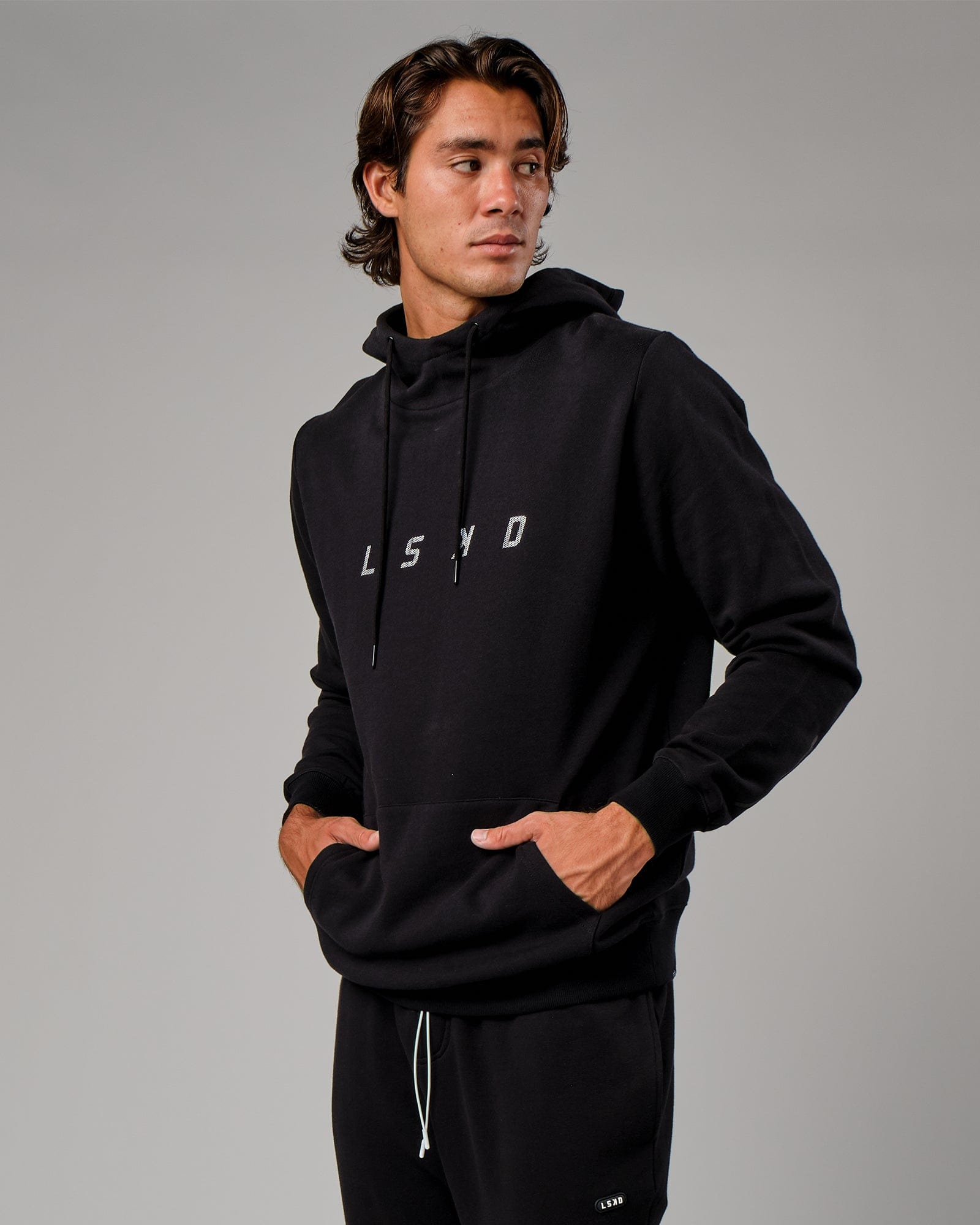 Model wearing Grid Hoodie - Black