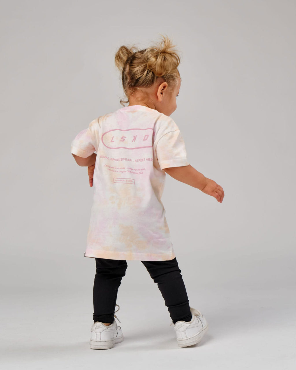 Model wearing CTA Tee (00-8) - Tutti Frutti Tie Dye