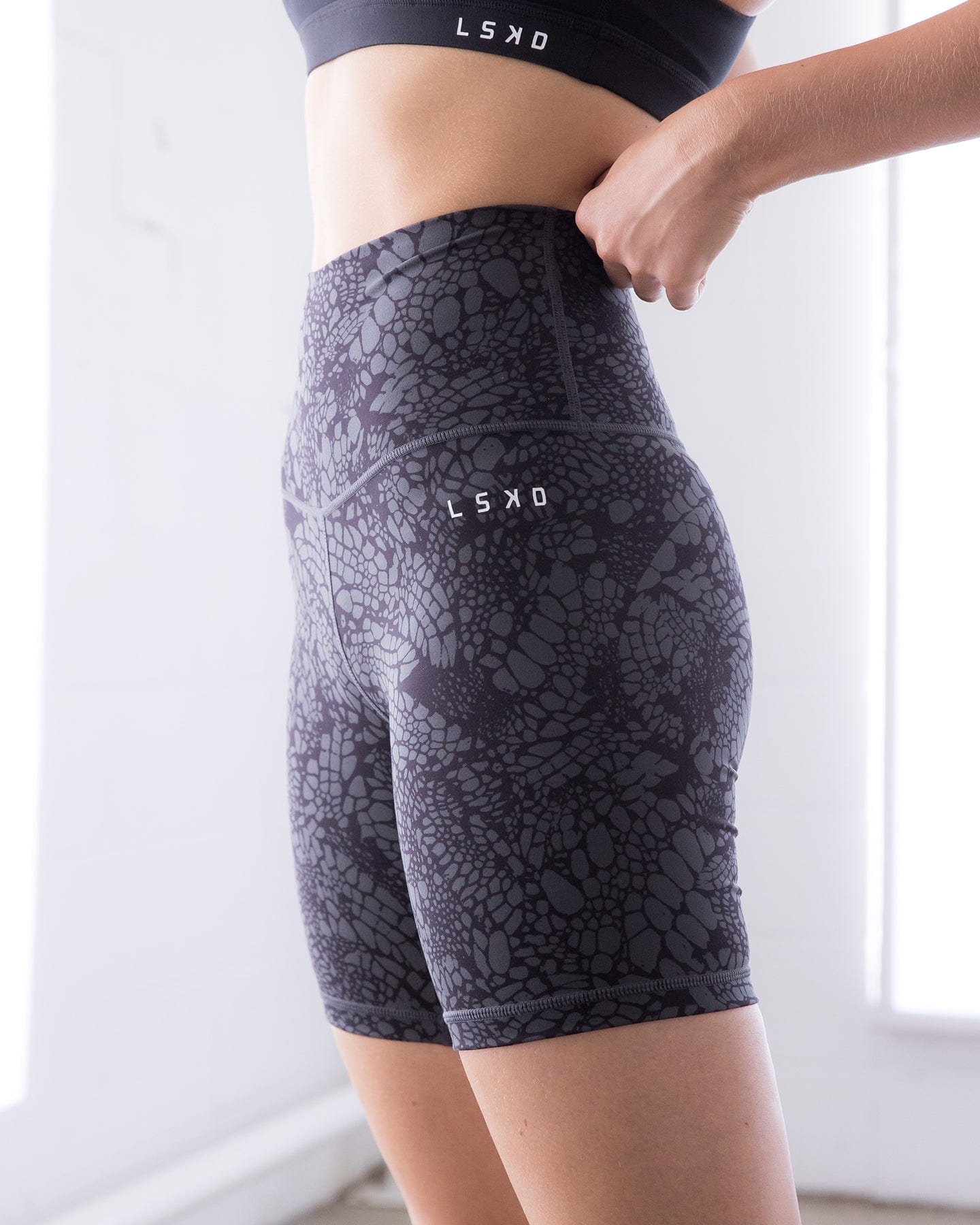 Model wearing Base Mid Short Tight - Black Mamba