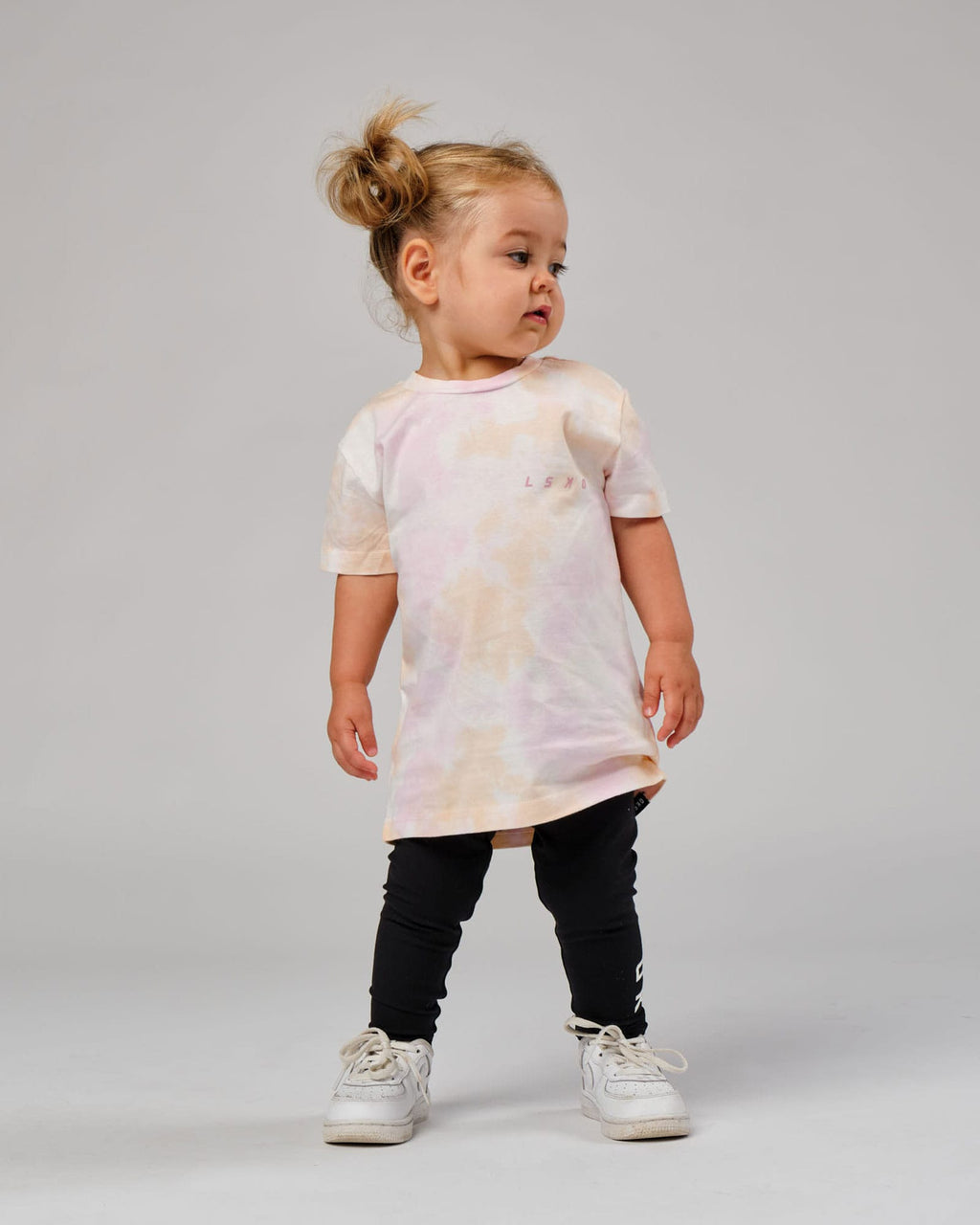 Model wearing CTA Tee (00-8) - Tutti Frutti Tie Dye