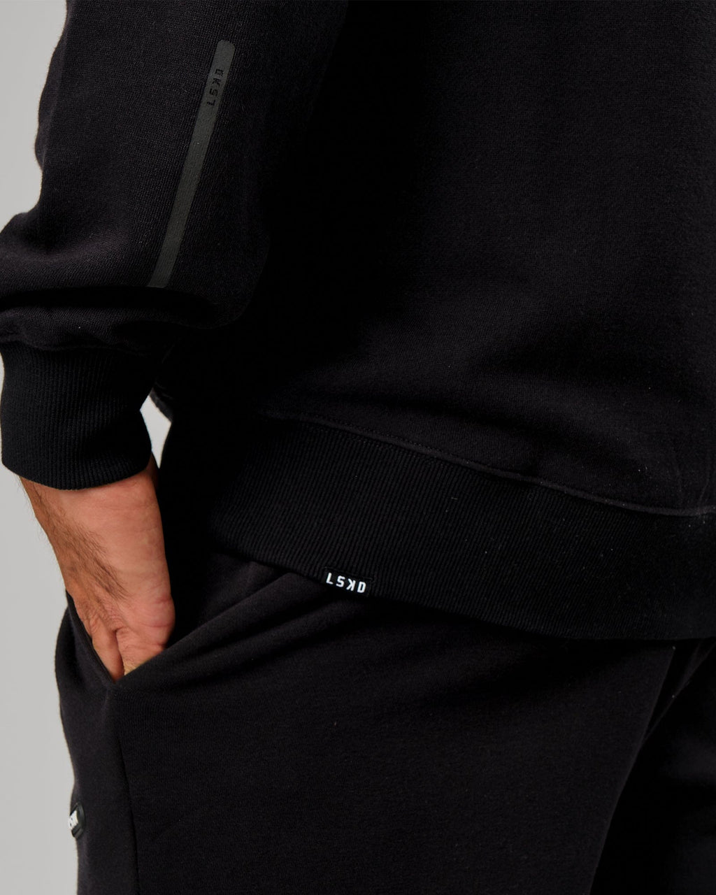 Model wearing Grid Hoodie - Black