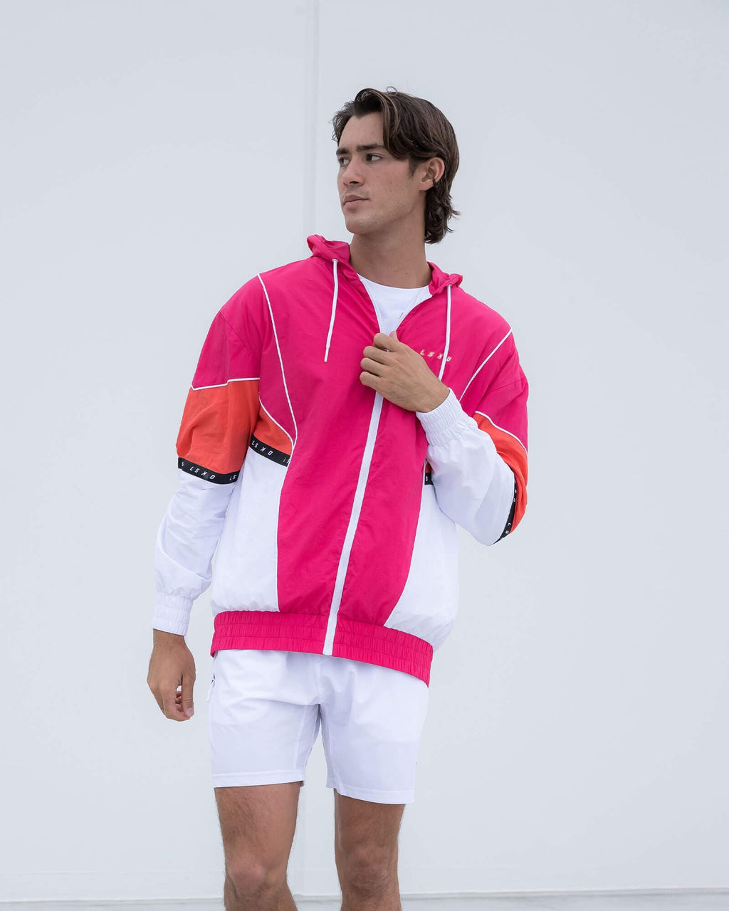 Model wearing Unisex Peak Zip Through Track Jacket Oversize - Boysenberry
