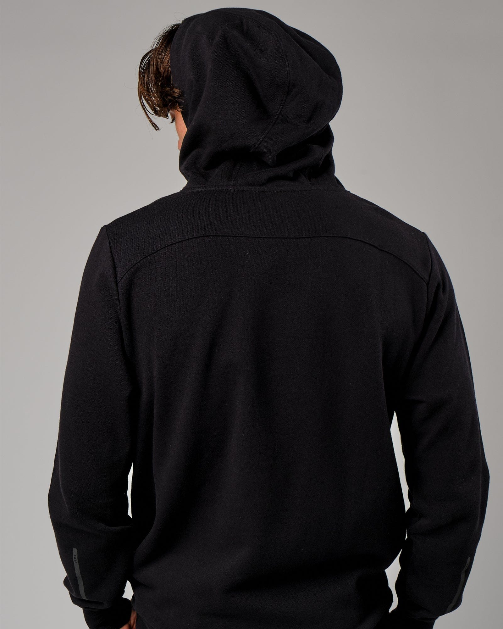 Model wearing Grid Hoodie - Black