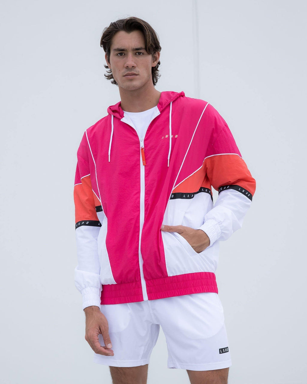 Model wearing Unisex Peak Zip Through Track Jacket Oversize - Boysenberry