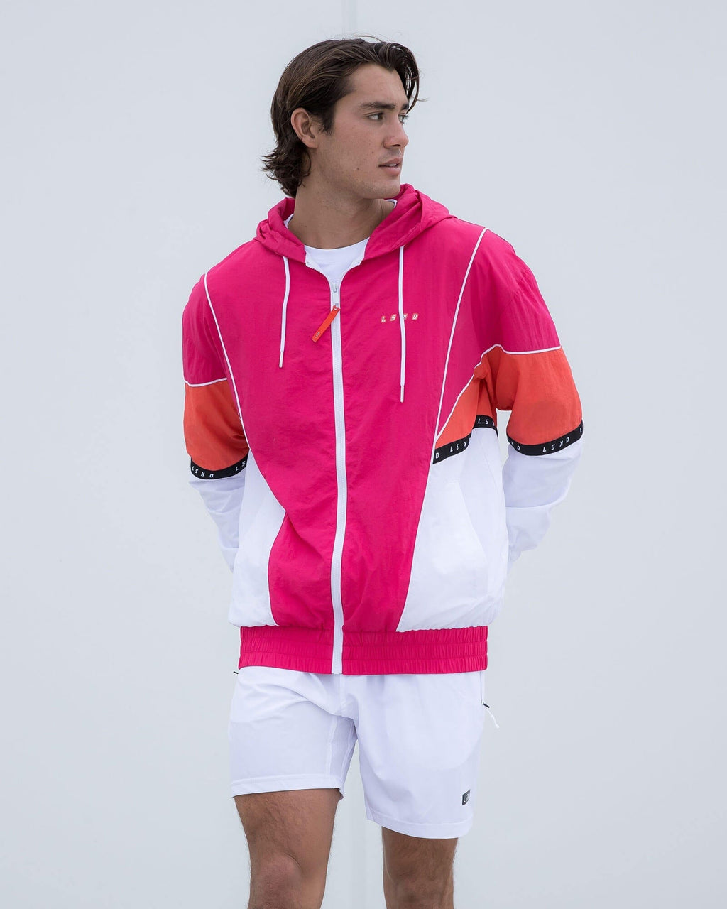 Model wearing Unisex Peak Zip Through Track Jacket Oversize - Boysenberry