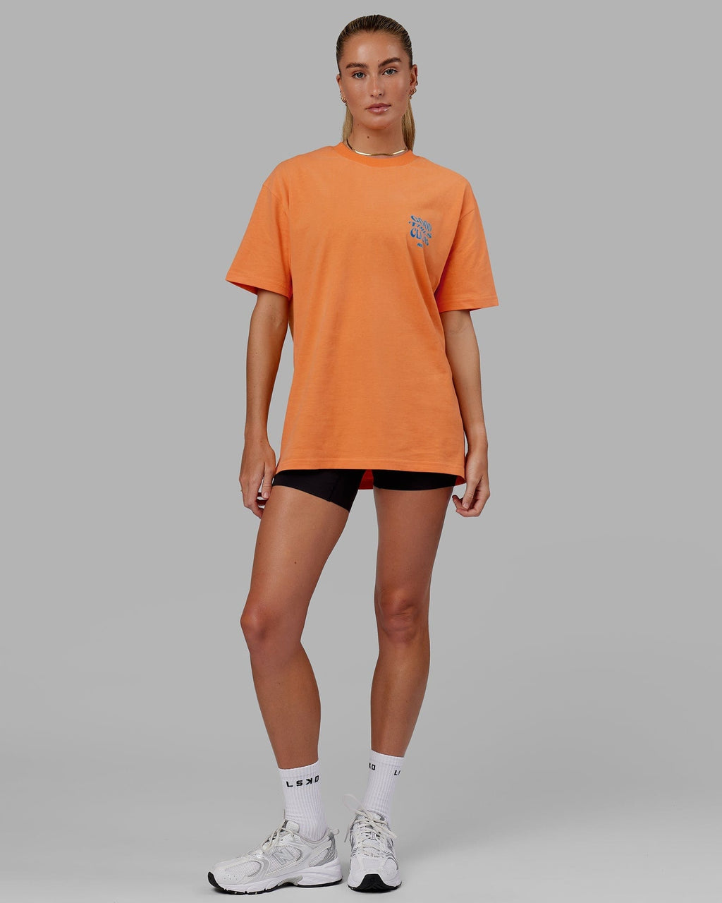 Model wearing Unisex Good Times Heavyweight Tee Oversize - Tangerine-Blue
