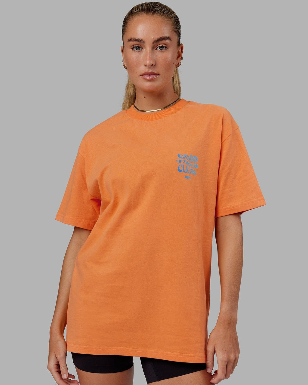 Model wearing Unisex Good Times Heavyweight Tee Oversize - Tangerine-Blue