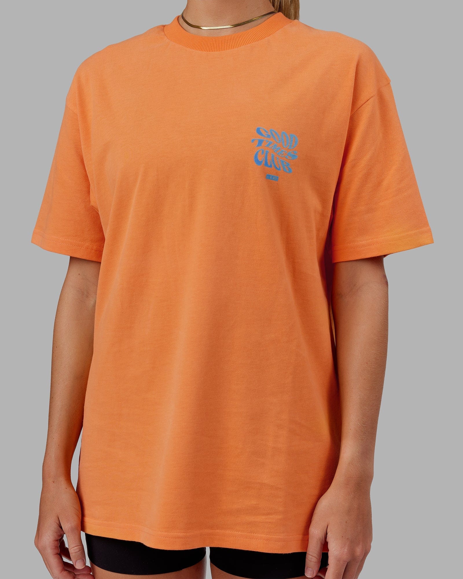 Model wearing Unisex Good Times Heavyweight Tee Oversize - Tangerine-Blue