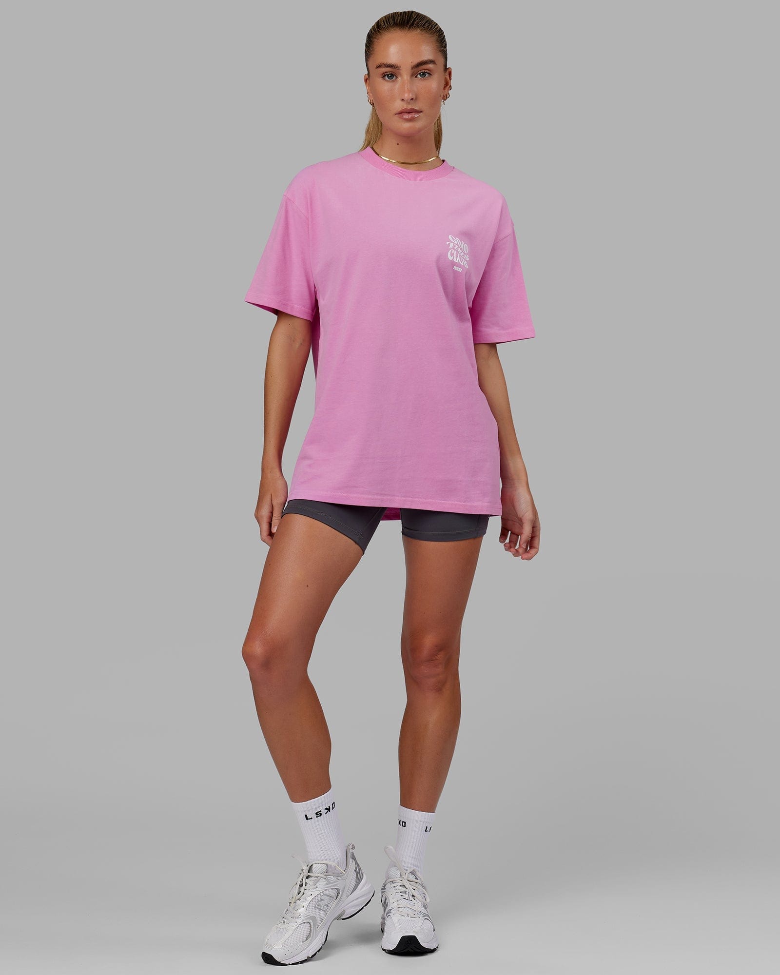 Model wearing Unisex Good Times Heavyweight Tee Oversize - Spark Pink