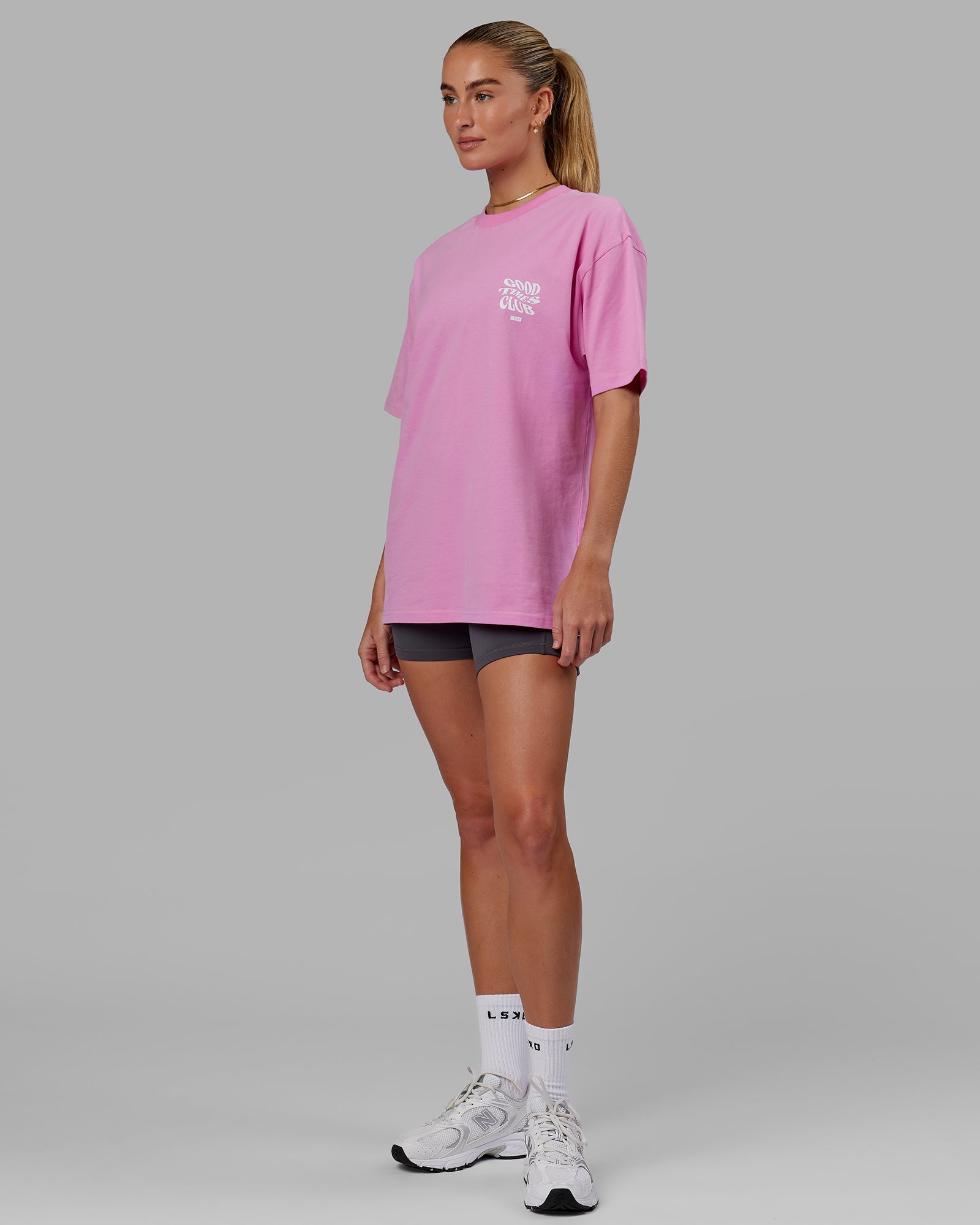 Model wearing Unisex Good Times Heavyweight Tee Oversize - Spark Pink