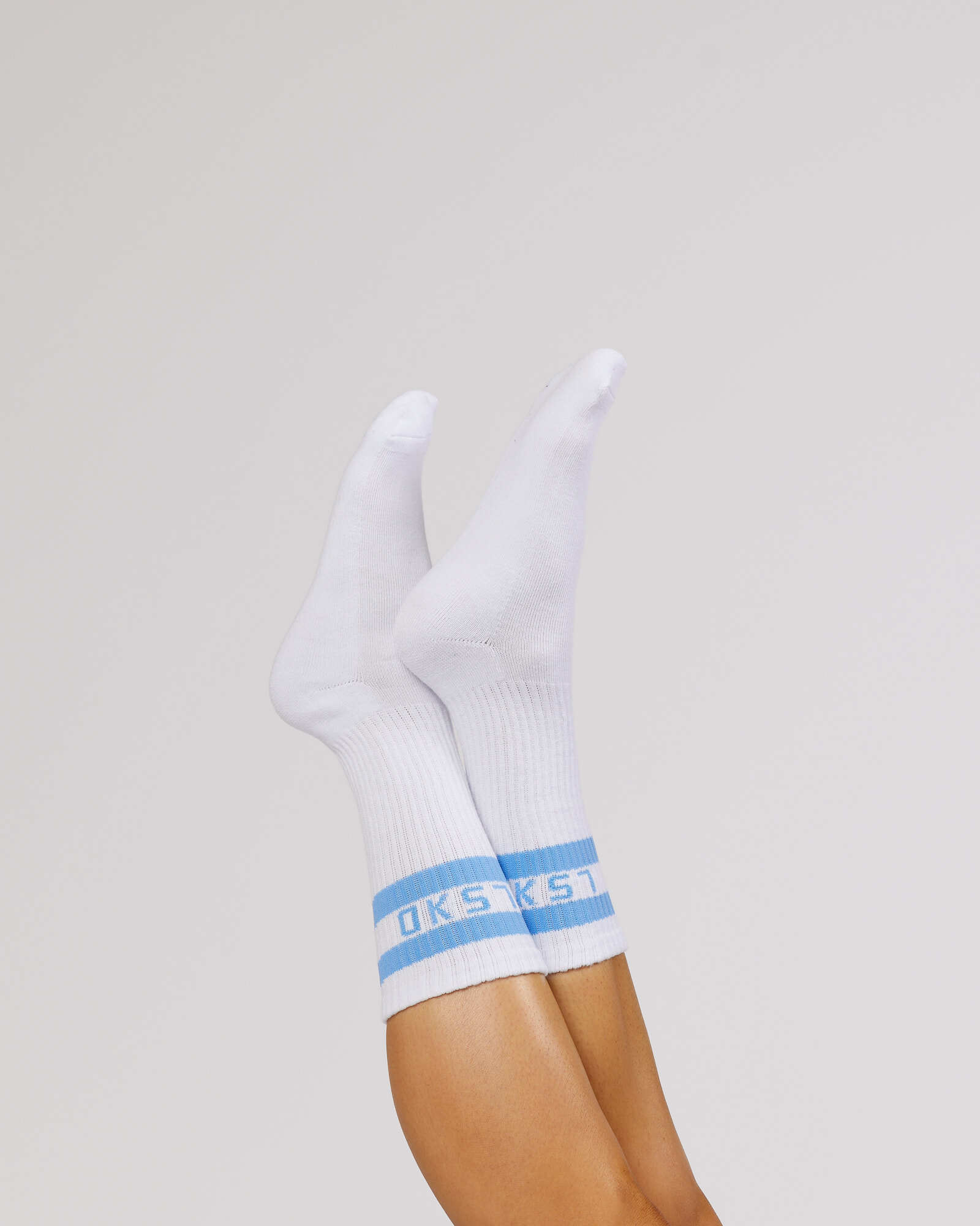Model wearing A-Line Crew Sock - Soft Blue