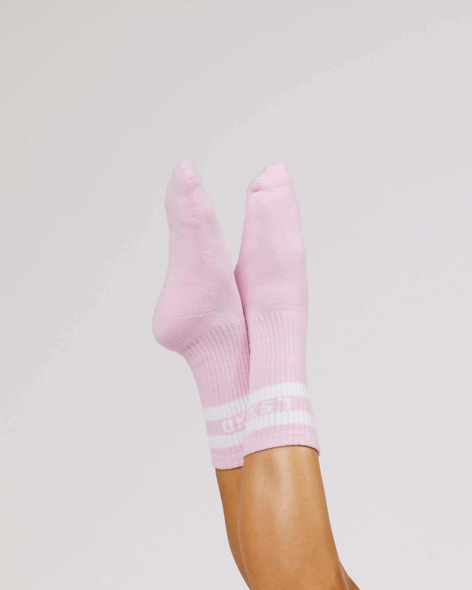 Model wearing A-Line Crew Sock - Petal Pink