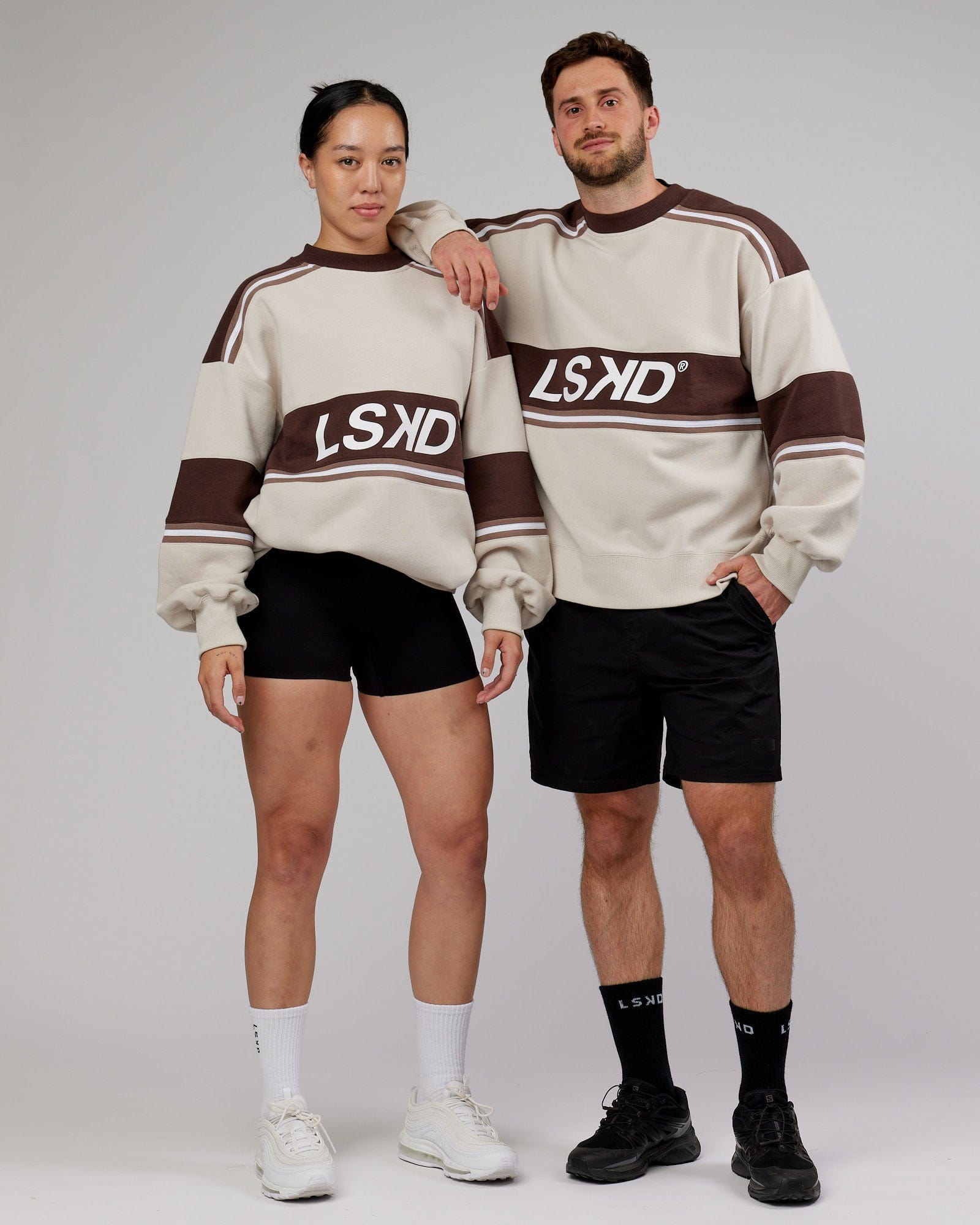 Model wearing Unisex A-Team Sweater Oversize - White-Deep Taupe