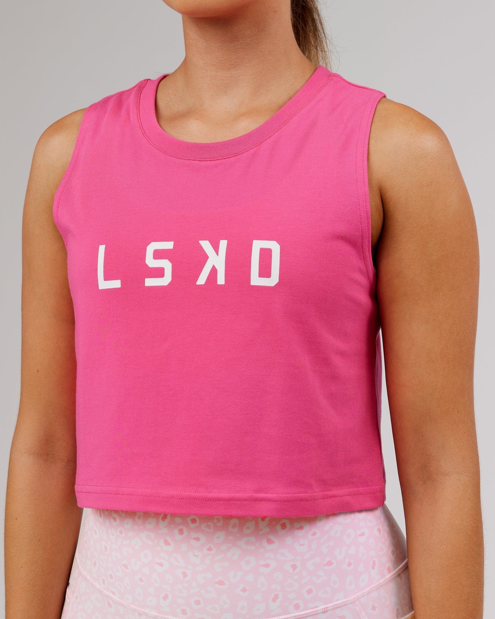 Model wearing Agile FLXCotton Tank - Flamingo