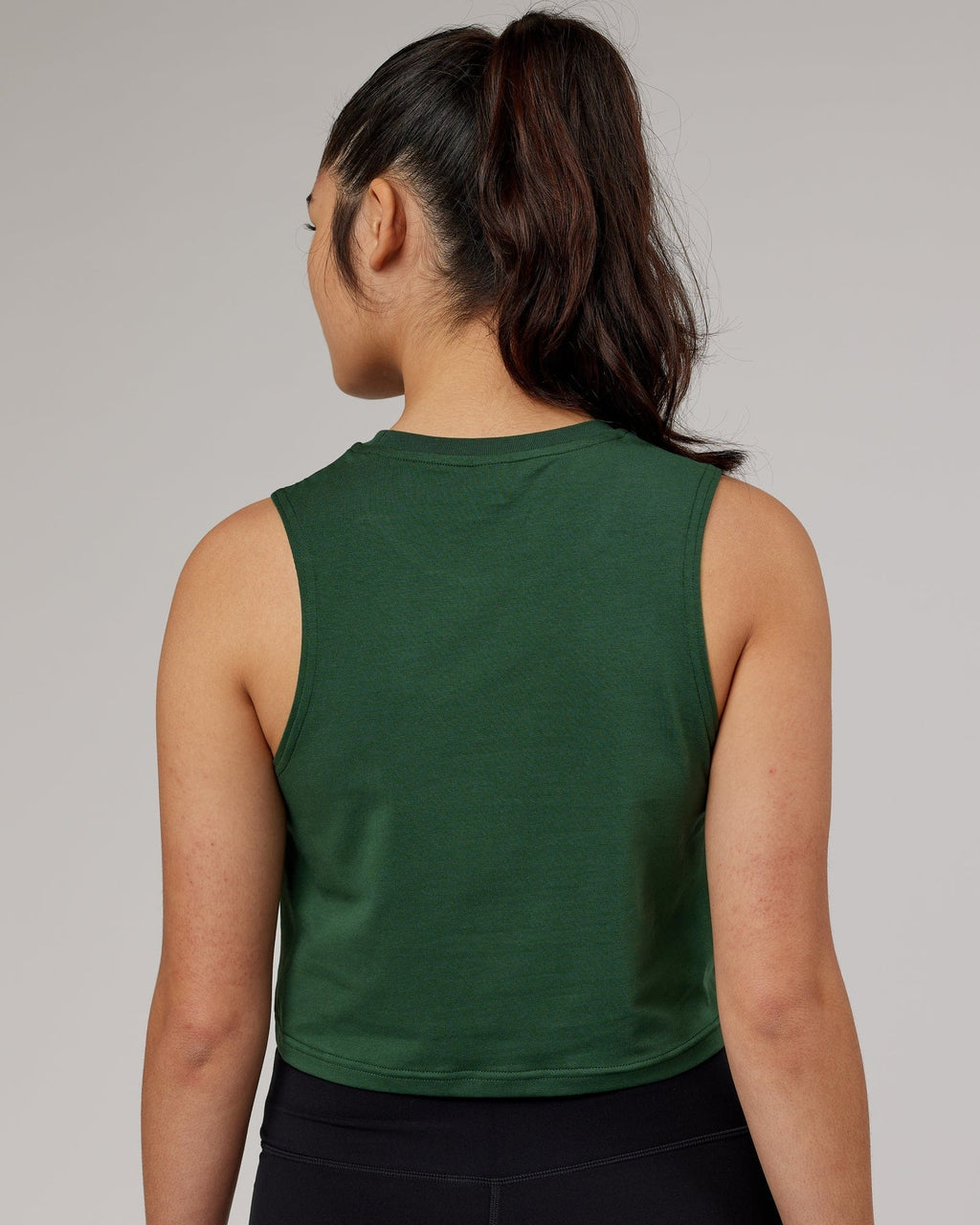 Model wearing Agile FLXCotton  Tank - Pineneedle