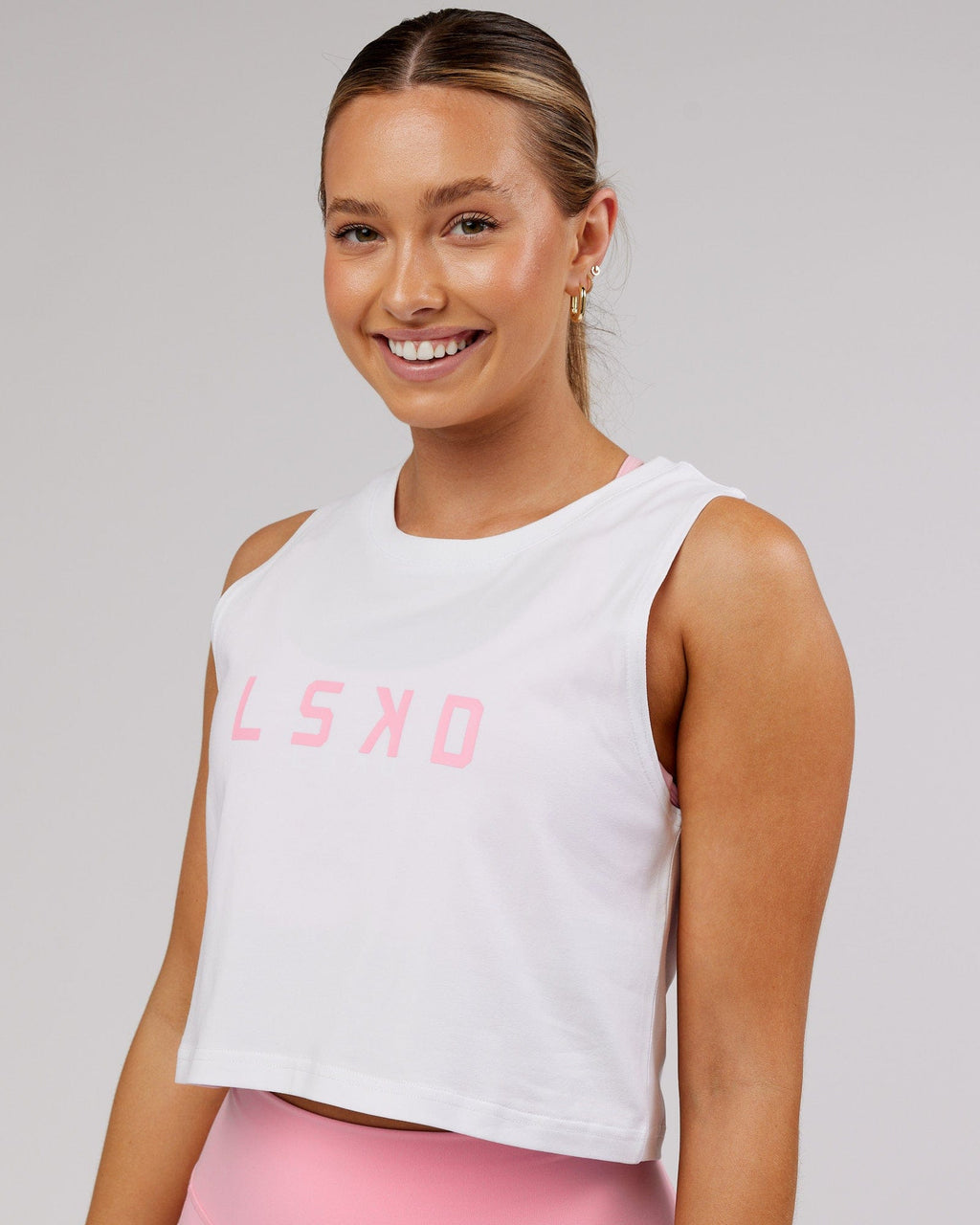 Model wearing Agile FLXCotton Tank - White-Pink