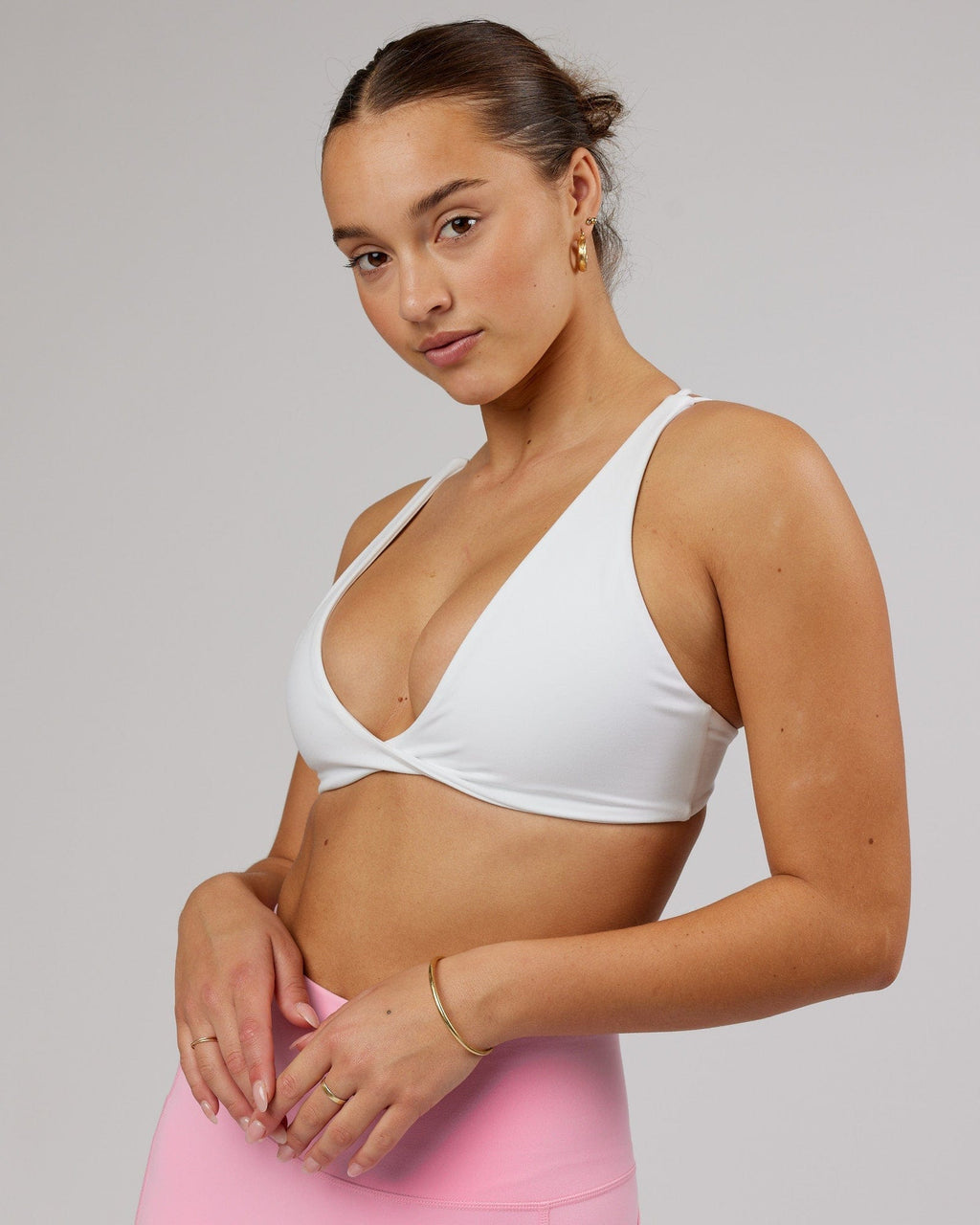 Model wearing Agile Sports Bra - White-Flamingo