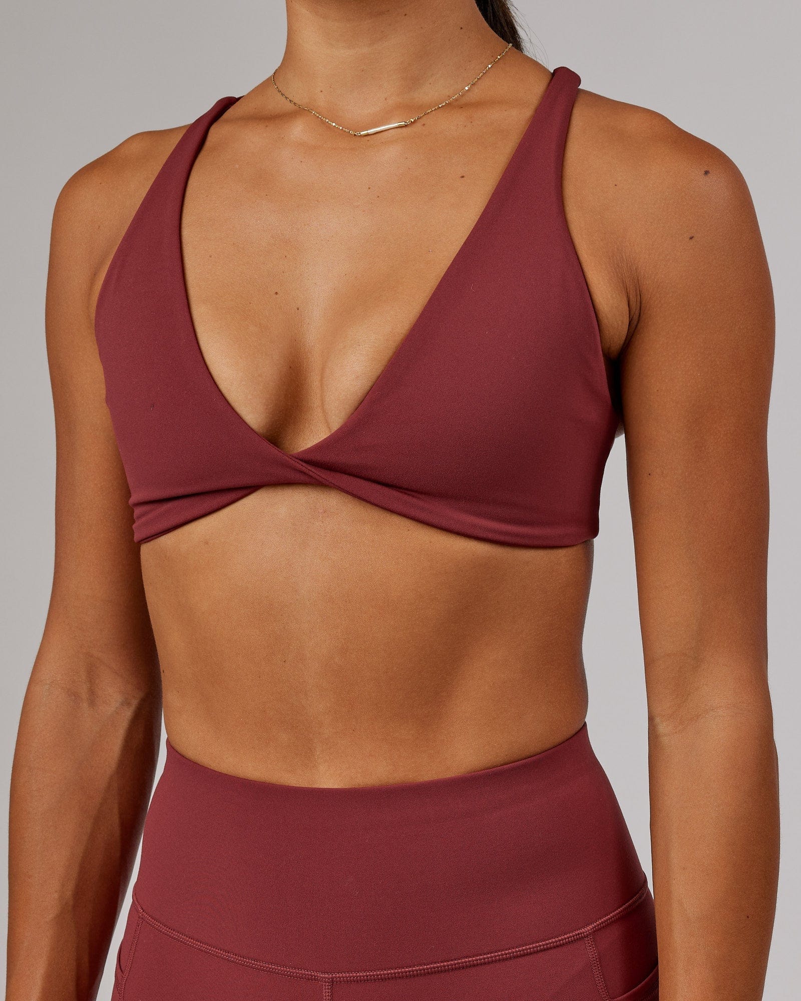 Model wearing Agile Sports Bra - Apple Berry