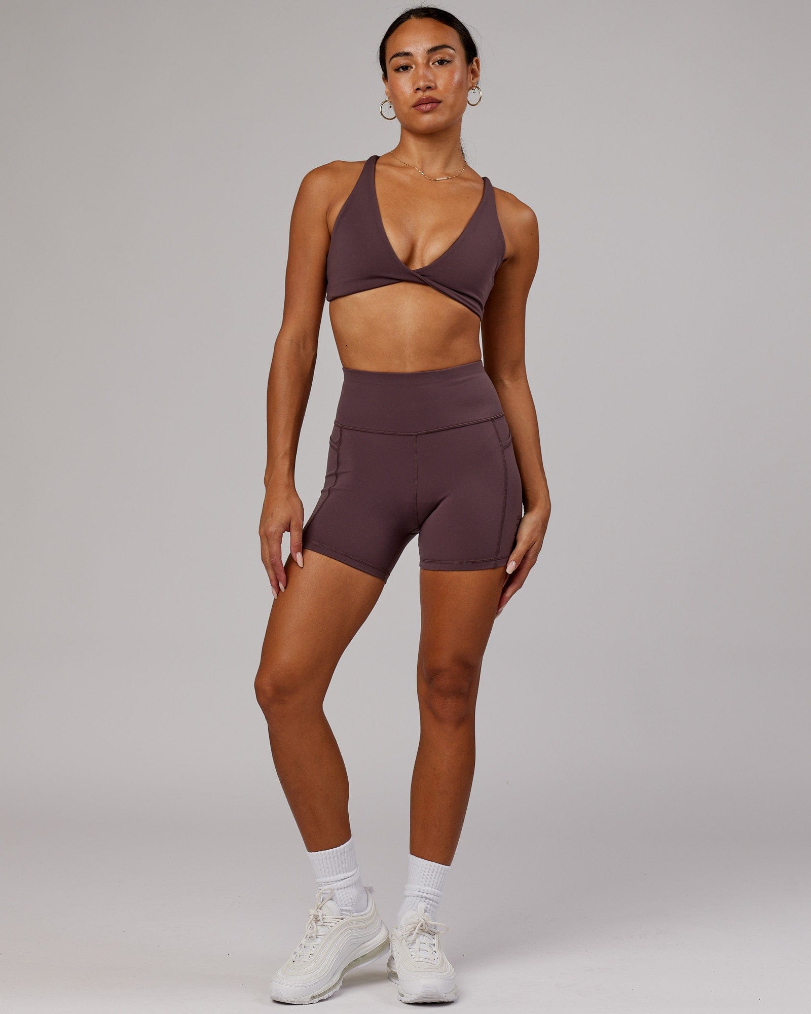 Model wearing Agile Sports Bra - Plum
