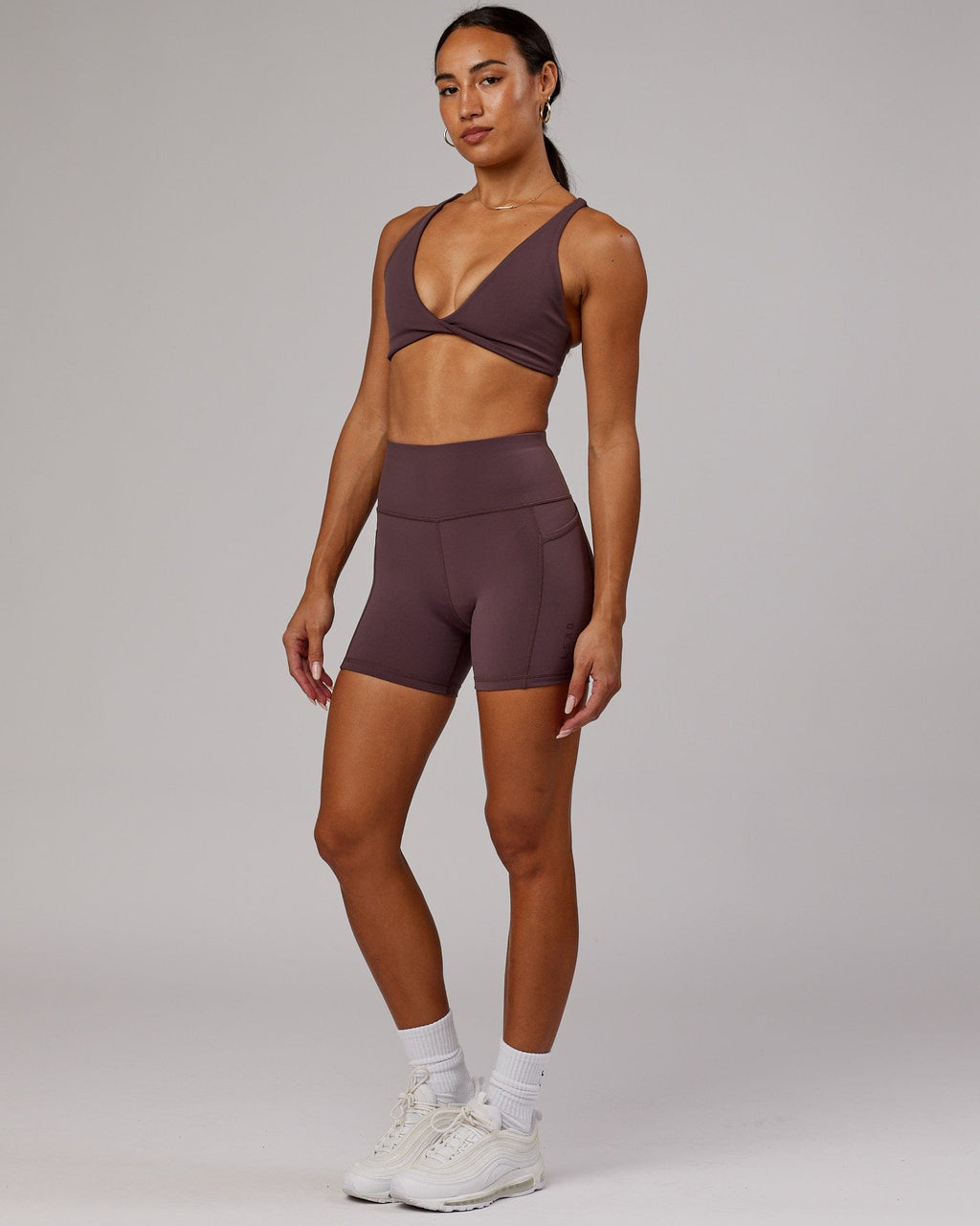 Model wearing Agile Sports Bra - Plum
