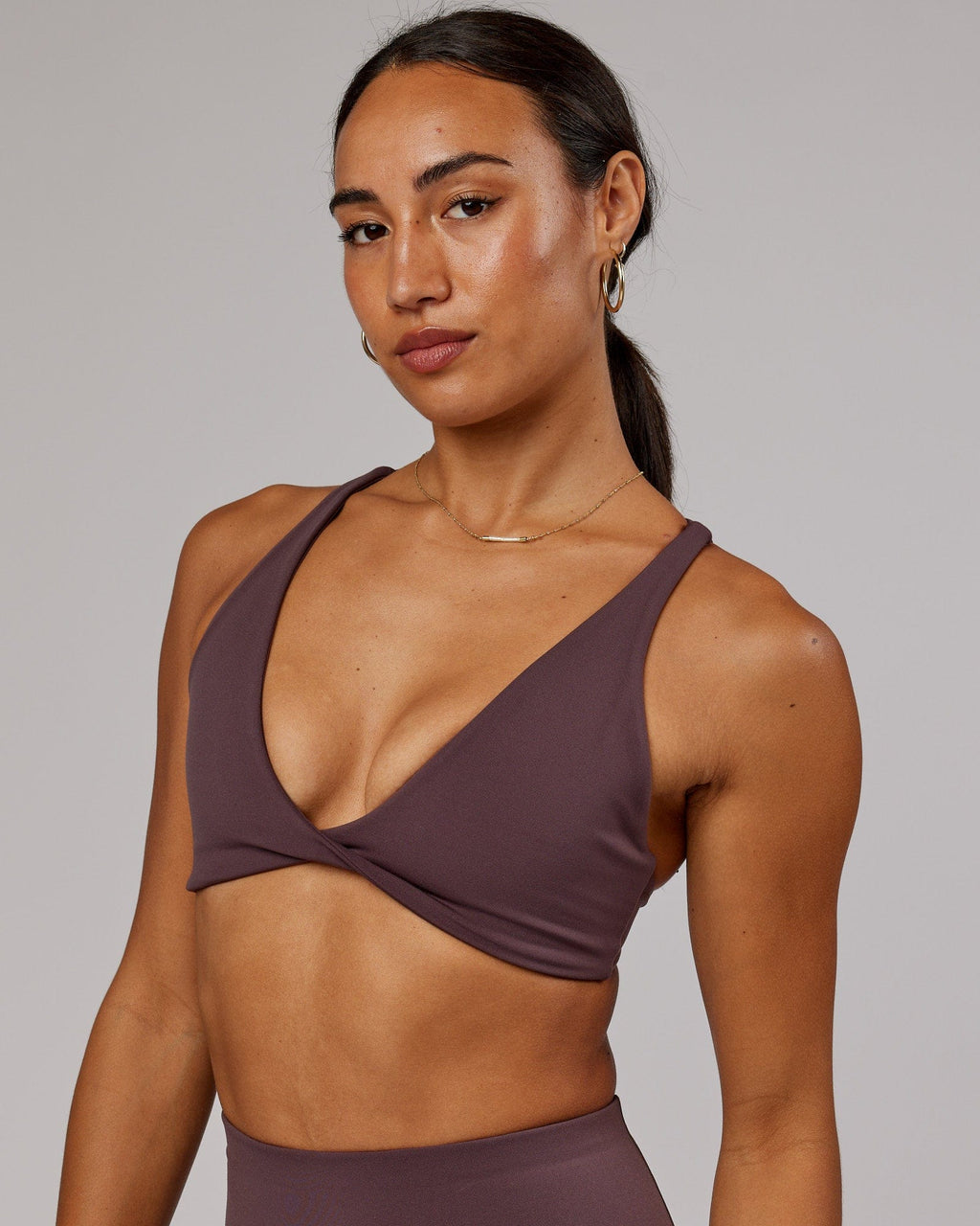 Model wearing Agile Sports Bra - Plum