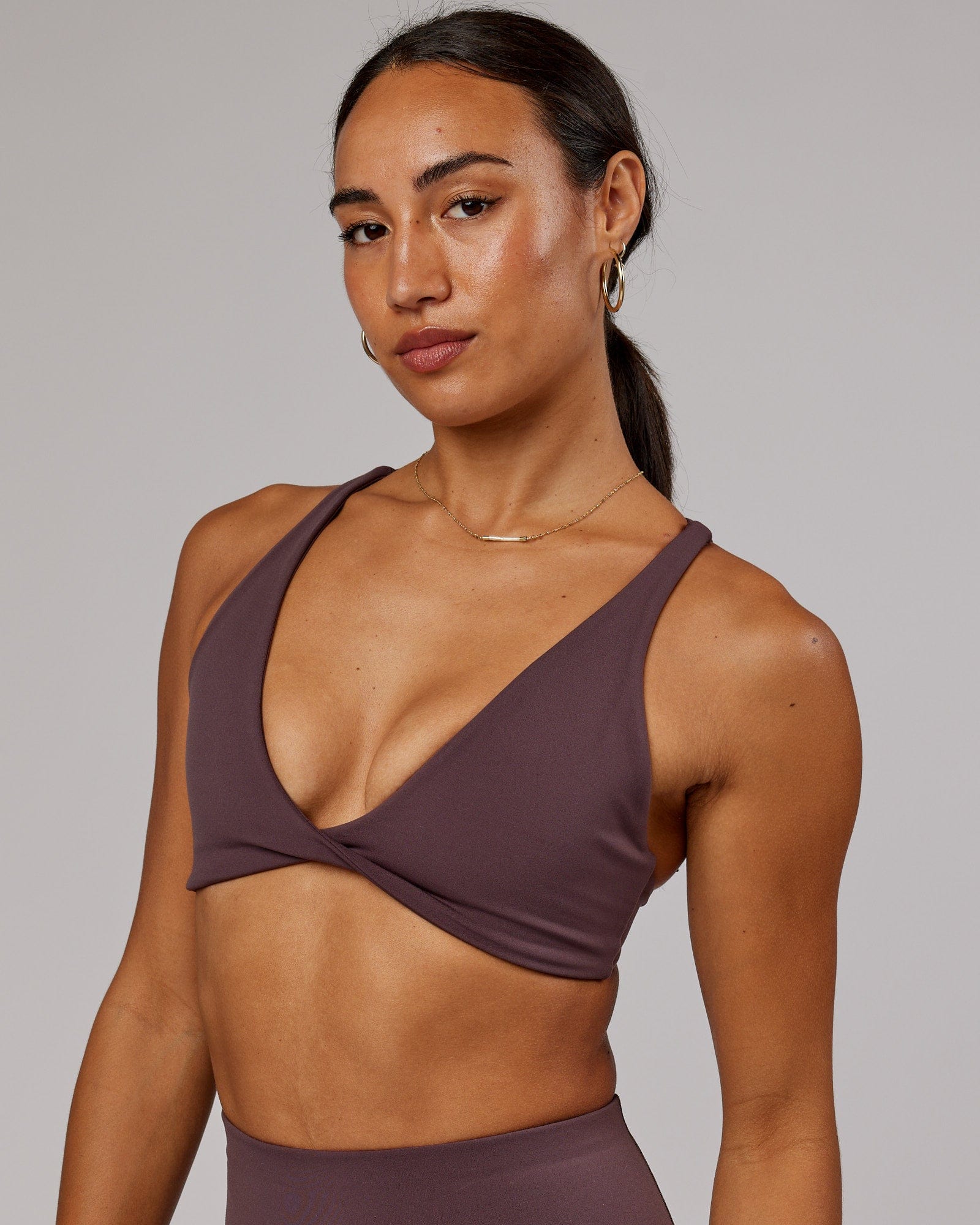 Model wearing Agile Sports Bra - Plum