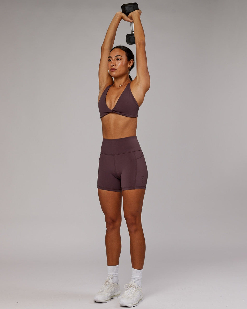 Model wearing Agile Sports Bra - Plum