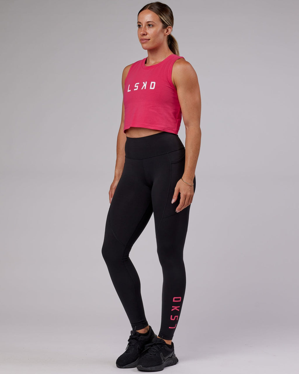 Model wearing Agile FLXCotton Tank - Boysenberry